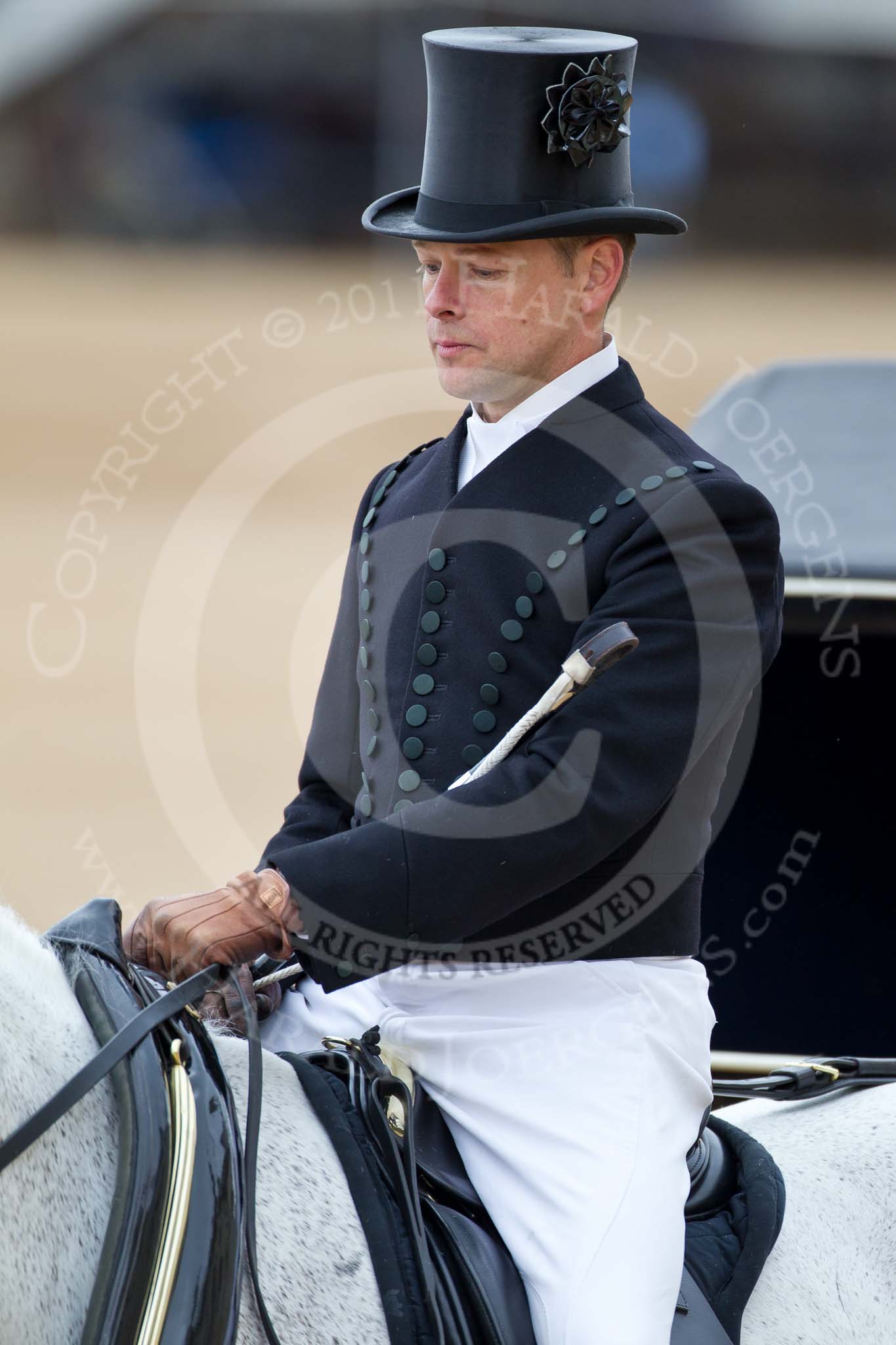 The Major General's Review 2011: Close-up of head coachman Jack Hargreaves..
Horse Guards Parade, Westminster,
London SW1,
Greater London,
United Kingdom,
on 28 May 2011 at 12:07, image #277