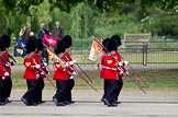 The Major General's Review 2011: The 'Keepers of the Ground', guardsmen of the participating guards divisions, marching onto Horse Guards Parade. They will mark, with the regimental flags, the position of each division on the parade ground. On the right side two Welsh Guards flags sporting the Welsh dragon..
Horse Guards Parade, Westminster,
London SW1,
Greater London,
United Kingdom,
on 28 May 2011 at 09:42, image #6