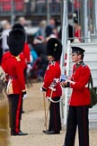 The Major General's Review 2011: Guardsman of the Welsh Guards selling the official programmes of the event to spectators..
Horse Guards Parade, Westminster,
London SW1,
Greater London,
United Kingdom,
on 28 May 2011 at 10:09, image #12