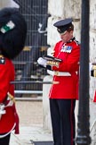 The Major General's Review 2011: Colour Sergeant of the Welsh Guards taking notes during the rehearsal..
Horse Guards Parade, Westminster,
London SW1,
Greater London,
United Kingdom,
on 28 May 2011 at 10:45, image #79