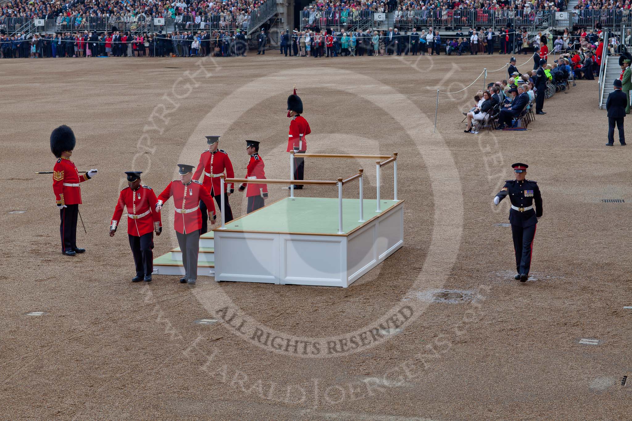 Trooping the Colour 2011: The saluting base for HM The Queen and HRH The Prince Philip has been assembled by guardsmen of the Welsh Guards, GSM 'Billy' Mott (with the pace stick, on the very left) making sure everything is done to the highest standard..
Horse Guards Parade, Westminster,
London SW1,
Greater London,
United Kingdom,
on 11 June 2011 at 10:53, image #97