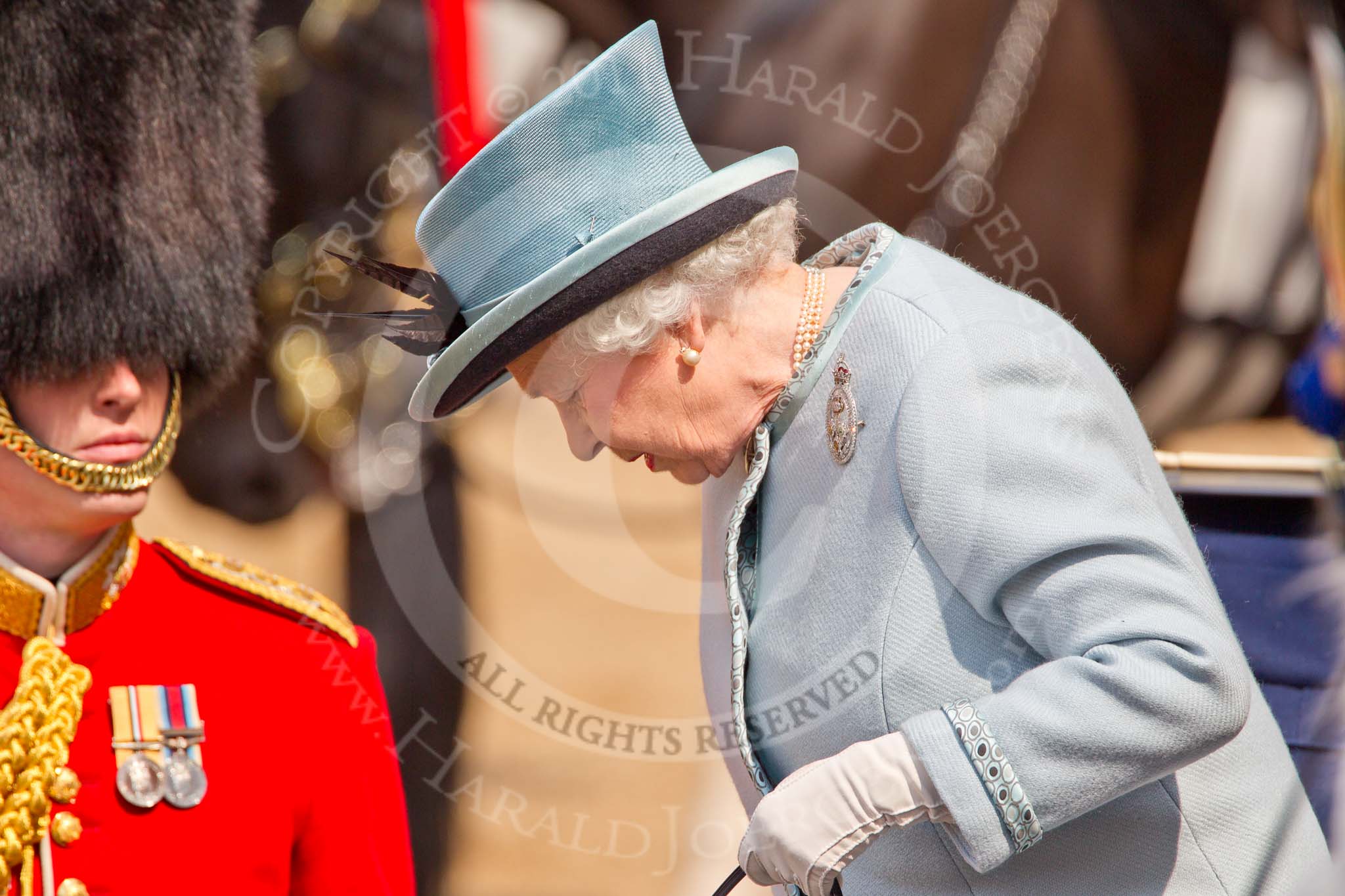 Trooping the Colour 2011: HM The Queen getting out of the ivory mounted phaeton at the beginning of her Birthday Parade in 2011..
Horse Guards Parade, Westminster,
London SW1,
Greater London,
United Kingdom,
on 11 June 2011 at 11:00, image #130