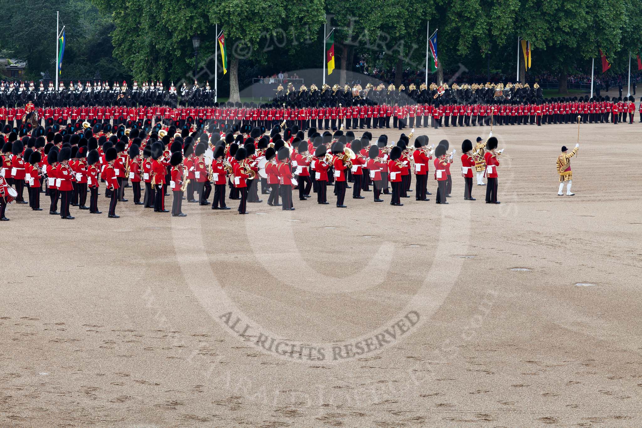 Trooping the Colour 2011: The Massed Bands playing, lead by the drum majors, during the Massed Bands Troop..
Horse Guards Parade, Westminster,
London SW1,
Greater London,
United Kingdom,
on 11 June 2011 at 11:14, image #190
