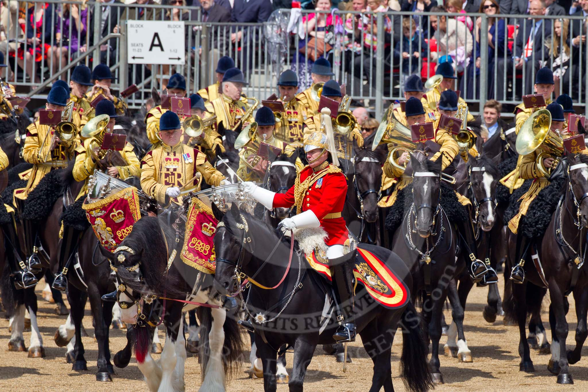 Trooping the Colour 2011: The Mounted Bands of the Household Cavalry moving onto the parade ground.   In red Major K L Davies, The Life Guards, Director of Music, on his right one of the two kettle drummers..
Horse Guards Parade, Westminster,
London SW1,
Greater London,
United Kingdom,
on 11 June 2011 at 11:53, image #315