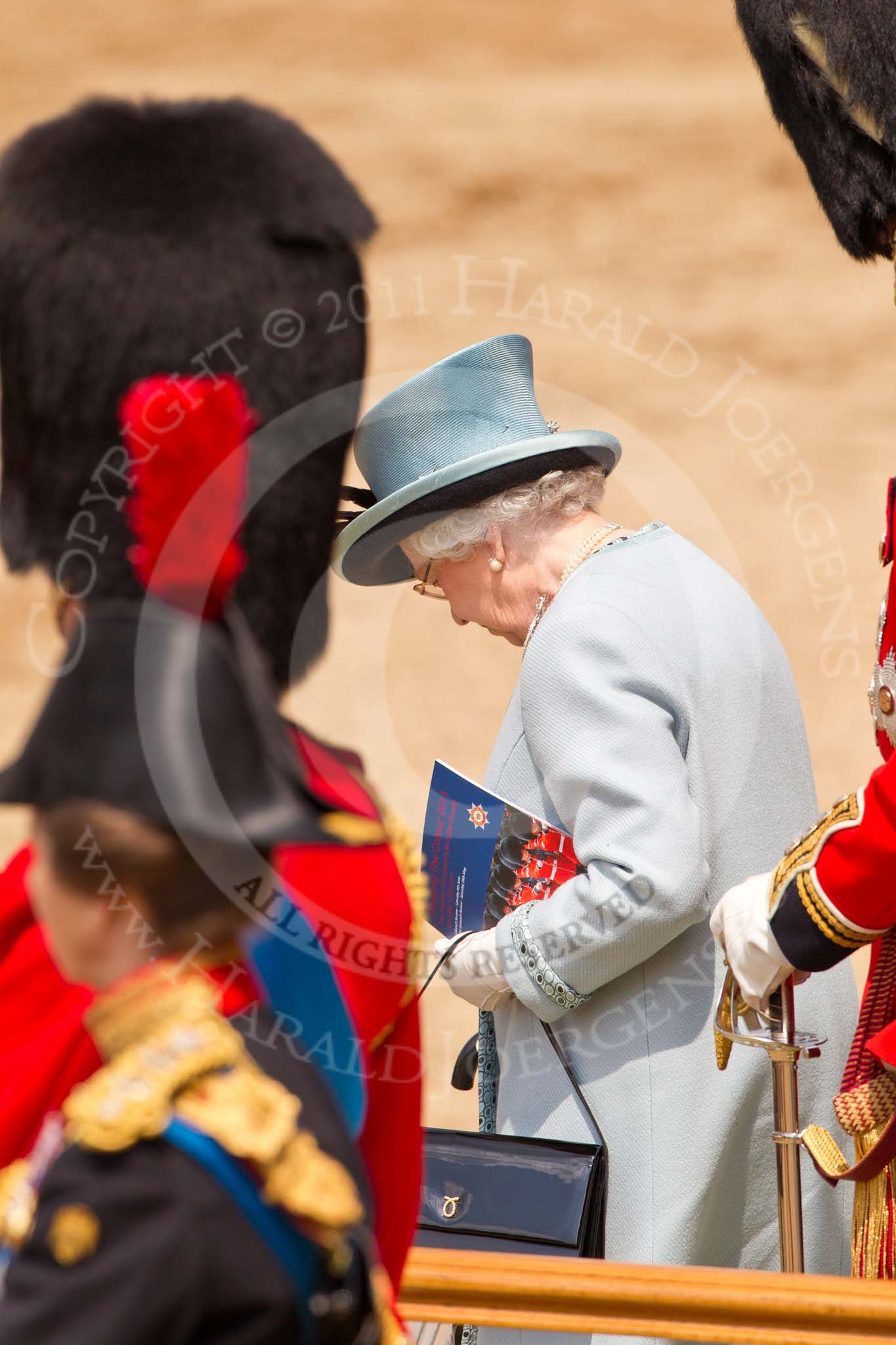 Trooping the Colour 2011: HM The Queen about to step down from the saluting base, to get into the ivory mounted phaeton, at the end of the parade..
Horse Guards Parade, Westminster,
London SW1,
Greater London,
United Kingdom,
on 11 June 2011 at 12:08, image #402