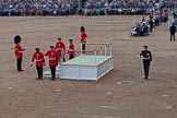 Trooping the Colour 2011: The saluting base for HM The Queen and HRH The Prince Philip has been assembled by guardsmen of the Welsh Guards, GSM 'Billy' Mott (with the pace stick, on the very left) making sure everything is done to the highest standard..
Horse Guards Parade, Westminster,
London SW1,
Greater London,
United Kingdom,
on 11 June 2011 at 10:53, image #97