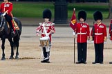 Trooping the Colour 2011: The Lone Drummer, Lance Corporal Gordon Prescott, about to leave the line, marching to a position at the right of the Escort to the Colour, where he will bear the 'drummers call', which will start the next phase of the parade..
Horse Guards Parade, Westminster,
London SW1,
Greater London,
United Kingdom,
on 11 June 2011 at 11:16, image #193