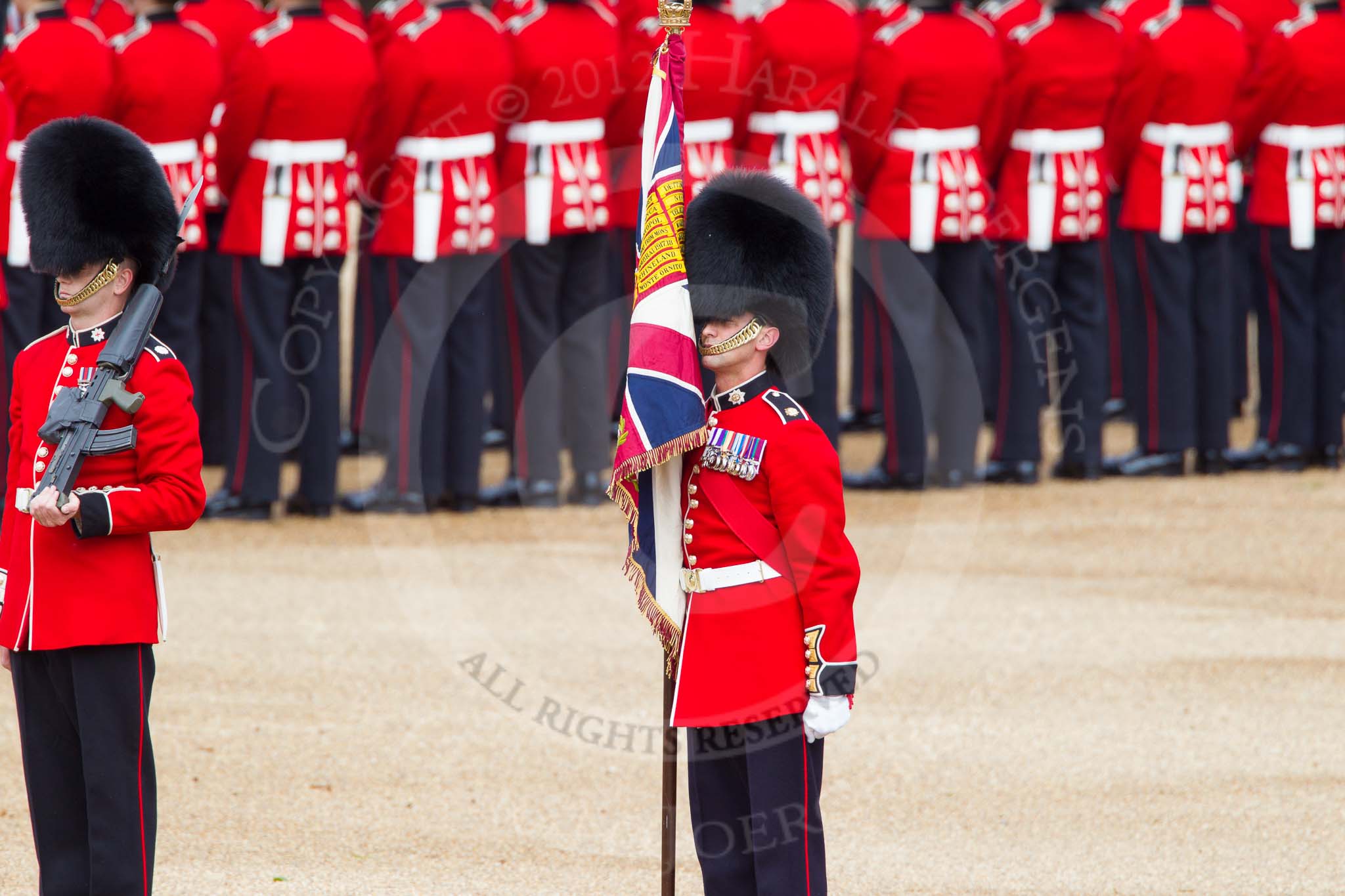 The Colonel's Review 2012: Colour Sergeant Paul Baines MC holding the uncased Colour, on his right one of the Ensigns..
Horse Guards Parade, Westminster,
London SW1,

United Kingdom,
on 09 June 2012 at 10:32, image #88
