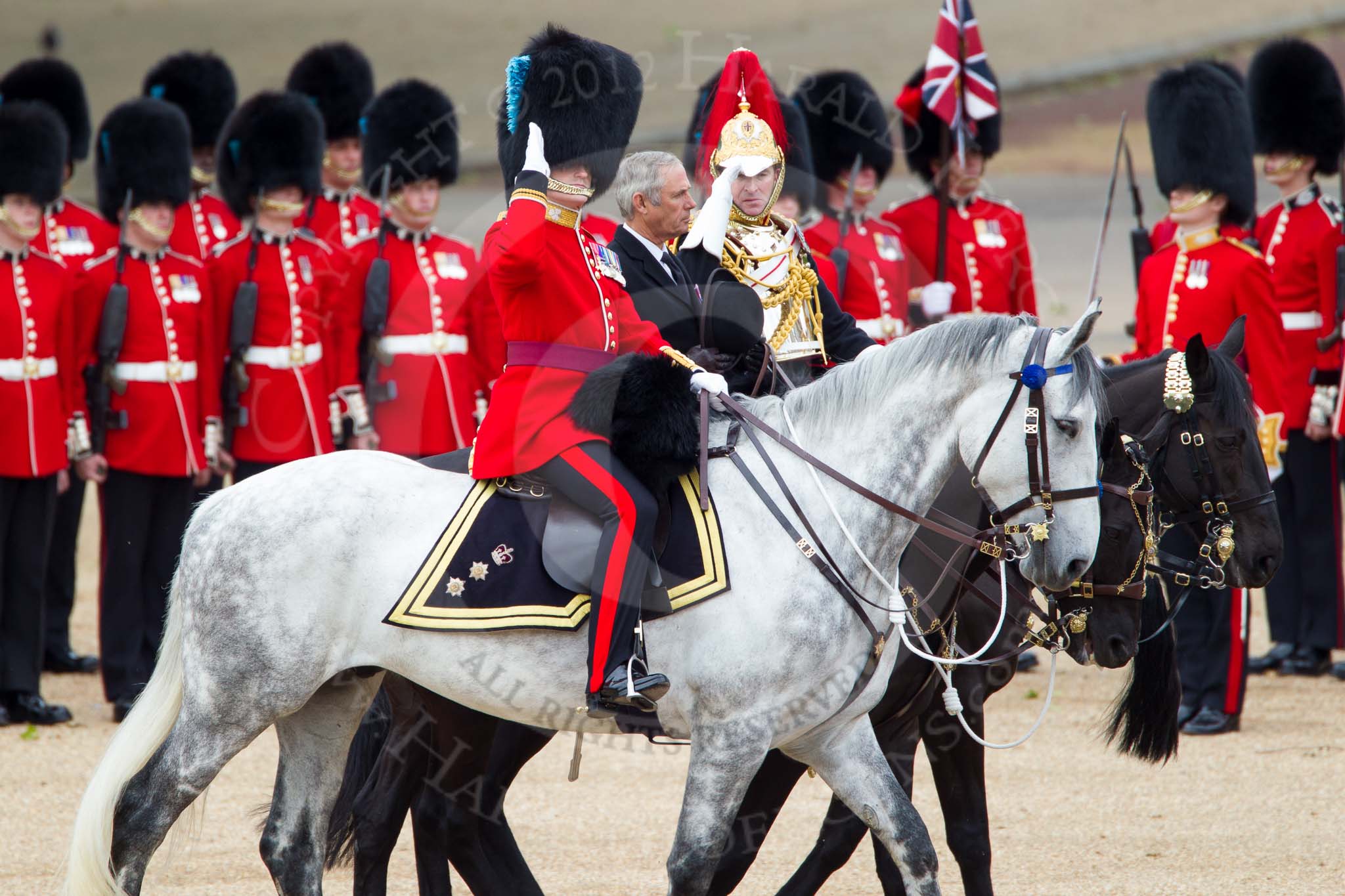 The Colonel's Review 2012: Representing the Royal Colonels (guessing here!): On the left, a Captain of the Irish Guards, riding the horse of the Duke of Cambridge, in the middle the Queen's Stud Groom, riding the Prince of Wales's horse, and on the right a Lieutenant Colonel of the Blues and Royal, riding the horse of the Princess Royal..
Horse Guards Parade, Westminster,
London SW1,

United Kingdom,
on 09 June 2012 at 11:01, image #179