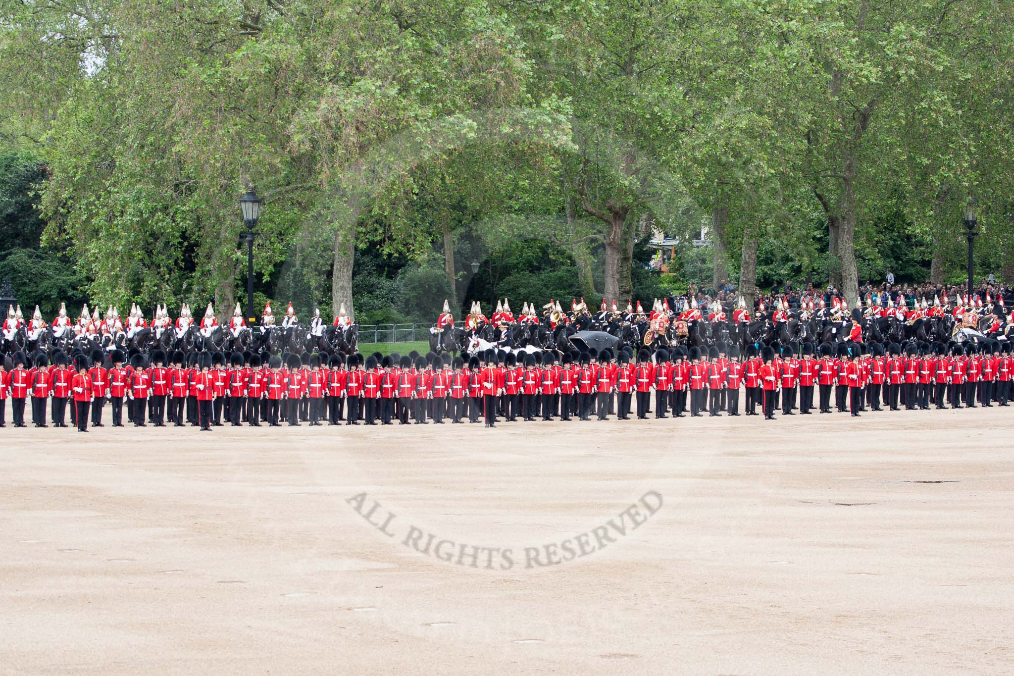 The Colonel's Review 2012: The Inspection of the Line continues behind No. 6 Guard towards the Souvereign's Escort, the Mounted Band of the Household Cavalry, and the King's Troop Royal Horse Artillery, all in position along the St James's Park side of Horse Guards Parade..
Horse Guards Parade, Westminster,
London SW1,

United Kingdom,
on 09 June 2012 at 11:02, image #186