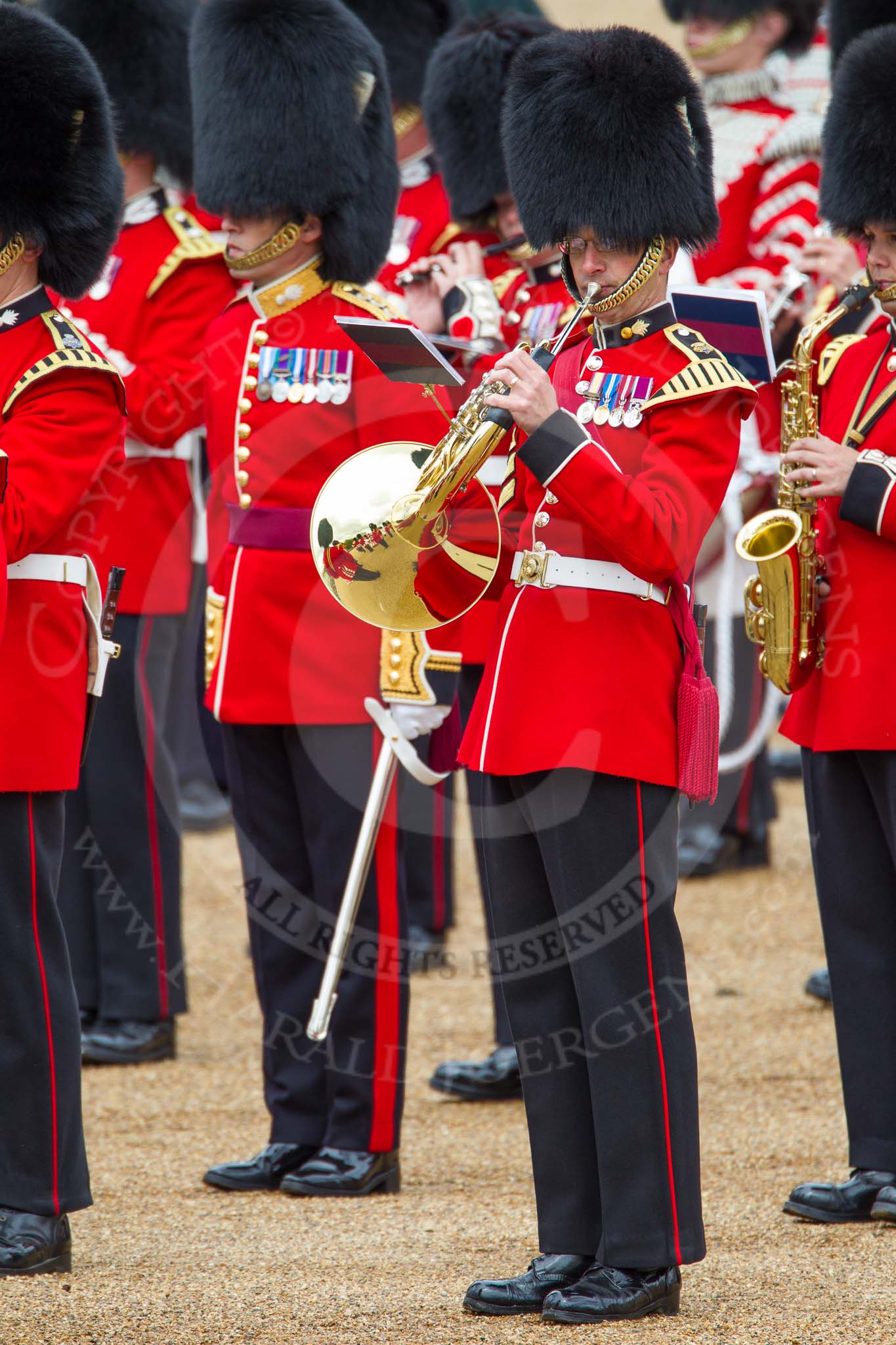 The Colonel's Review 2012: A Grenadier Guards Band ??ist (?) with the band reflected in the instrument..
Horse Guards Parade, Westminster,
London SW1,

United Kingdom,
on 09 June 2012 at 11:10, image #229