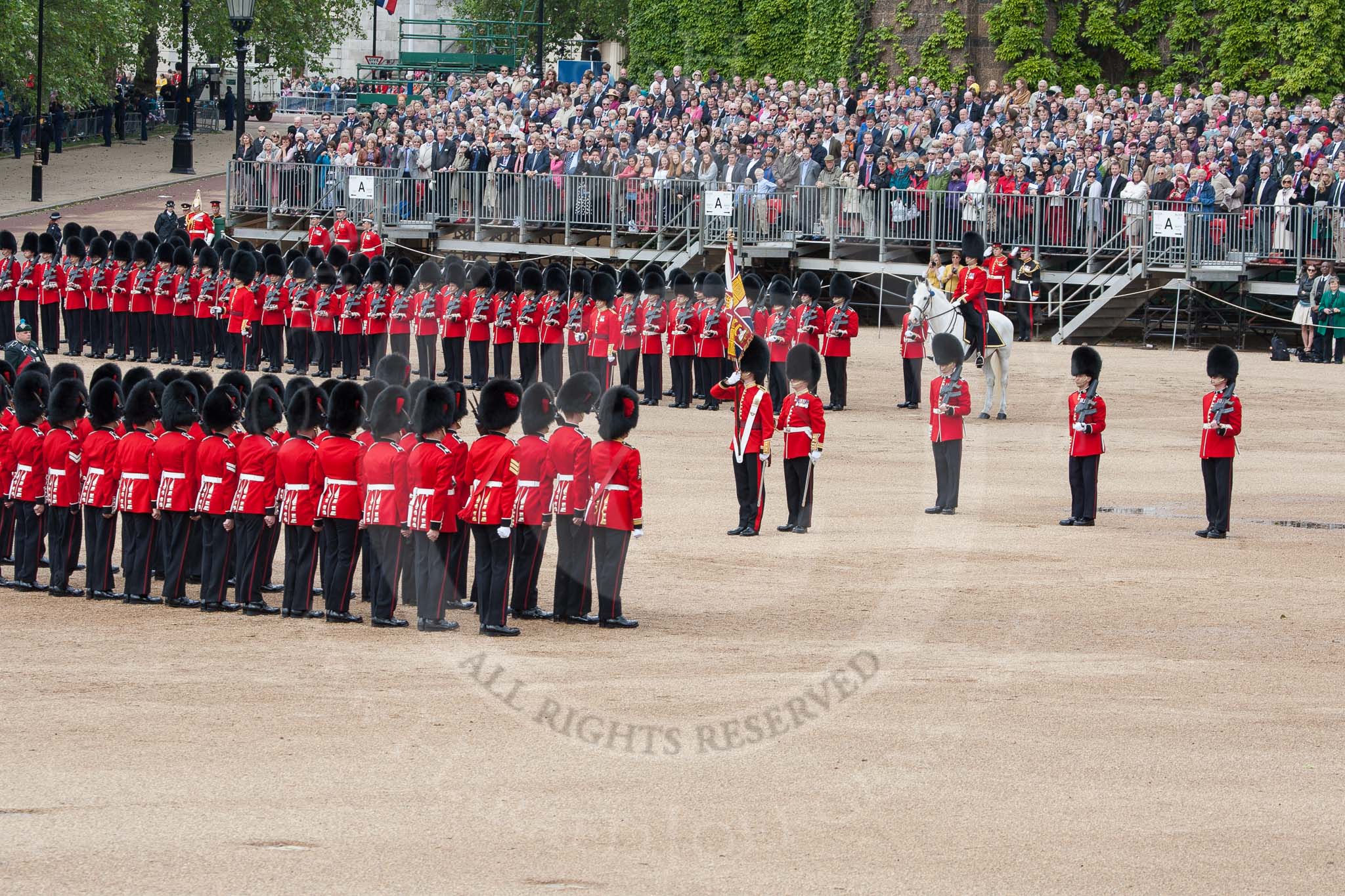 The Colonel's Review 2012: The Colour is now in the hands of No. 1 Guard, and the Colour Sergeant and the two Sentries (on the very right) have done their duty, and are ready to march off..
Horse Guards Parade, Westminster,
London SW1,

United Kingdom,
on 09 June 2012 at 11:19, image #276