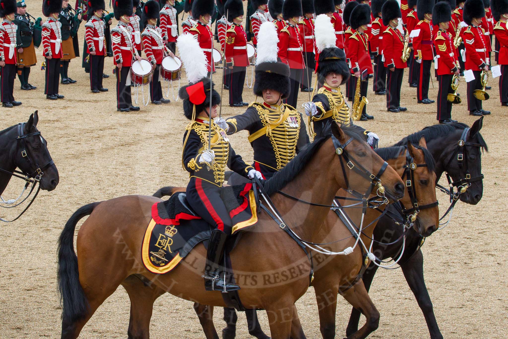 The Colonel's Review 2012: Royal Horse Artillery officers saluting during the Ride Past..
Horse Guards Parade, Westminster,
London SW1,

United Kingdom,
on 09 June 2012 at 11:51, image #398