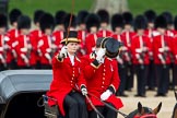 The Colonel's Review 2012: The second of the two carriages that would bring members of the Royal family to the event. Lady Coachman Phillipa Jackson is saluting with her whip..
Horse Guards Parade, Westminster,
London SW1,

United Kingdom,
on 09 June 2012 at 10:49, image #123