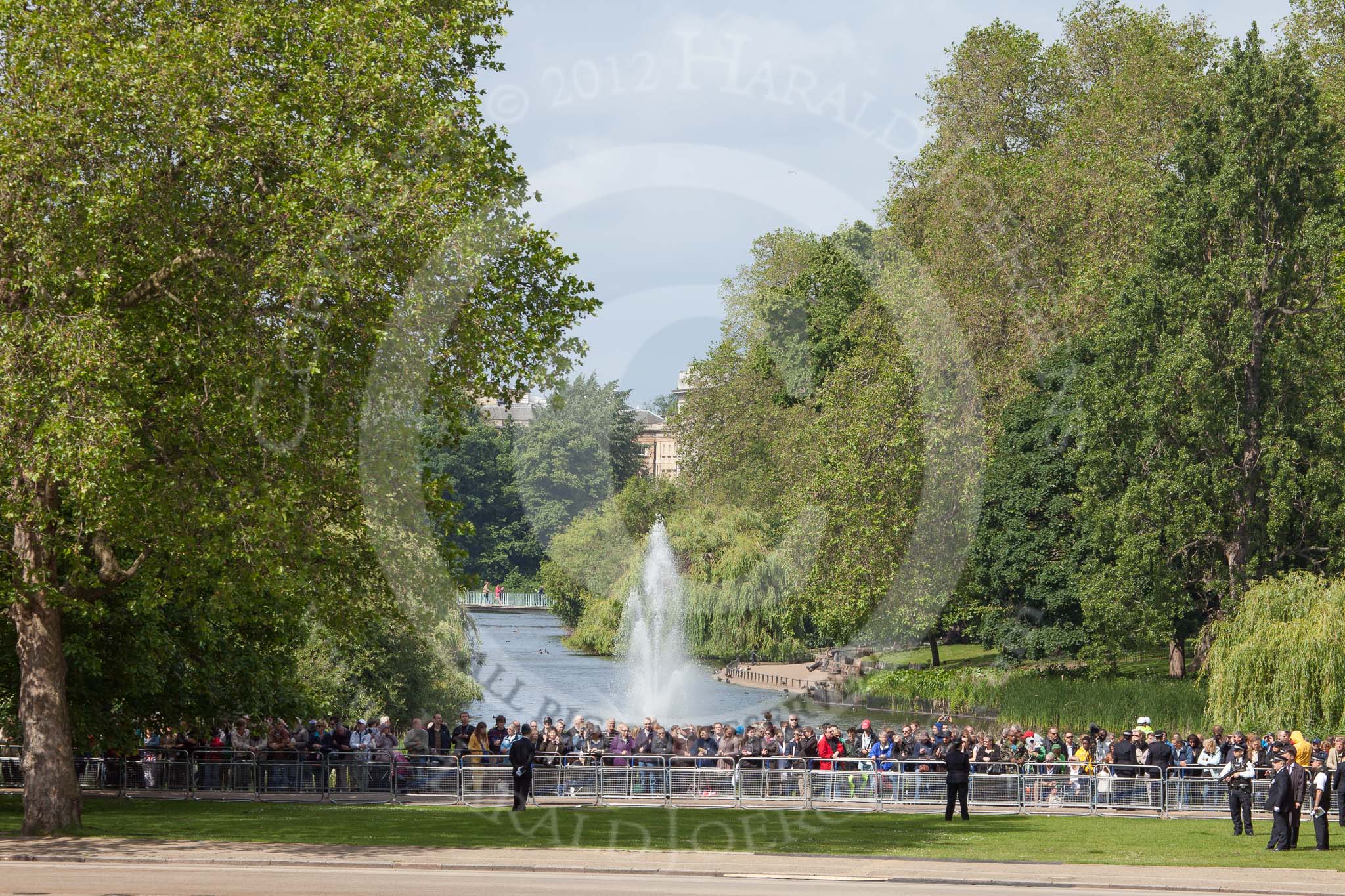 Trooping the Colour 2012: More spectators watching from the St. James's Park side of Horse Guards Parade - in the background Buckingham Palace..
Horse Guards Parade, Westminster,
London SW1,

United Kingdom,
on 16 June 2012 at 09:54, image #13