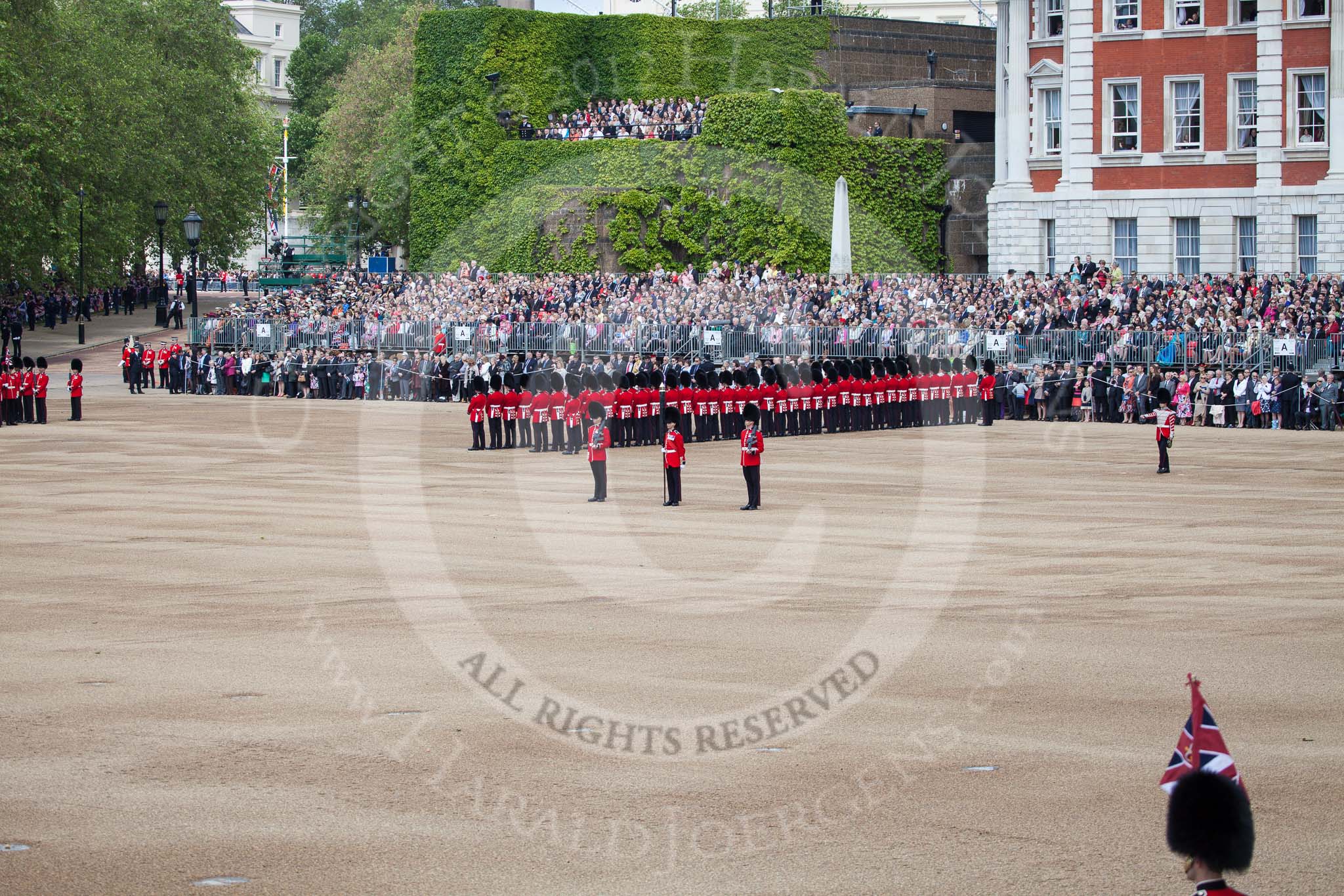 Trooping the Colour 2012: An overview of the Eastern side of Horse Guards Parade: On the left the approach road to the Mall, from where the Royal Party will arrive, then the ivy-covered Citadel, and the Old Admirality Building. In the centre the Colour Party, behind them No. 6 Guard, F Company Scots Guards..
Horse Guards Parade, Westminster,
London SW1,

United Kingdom,
on 16 June 2012 at 10:32, image #75