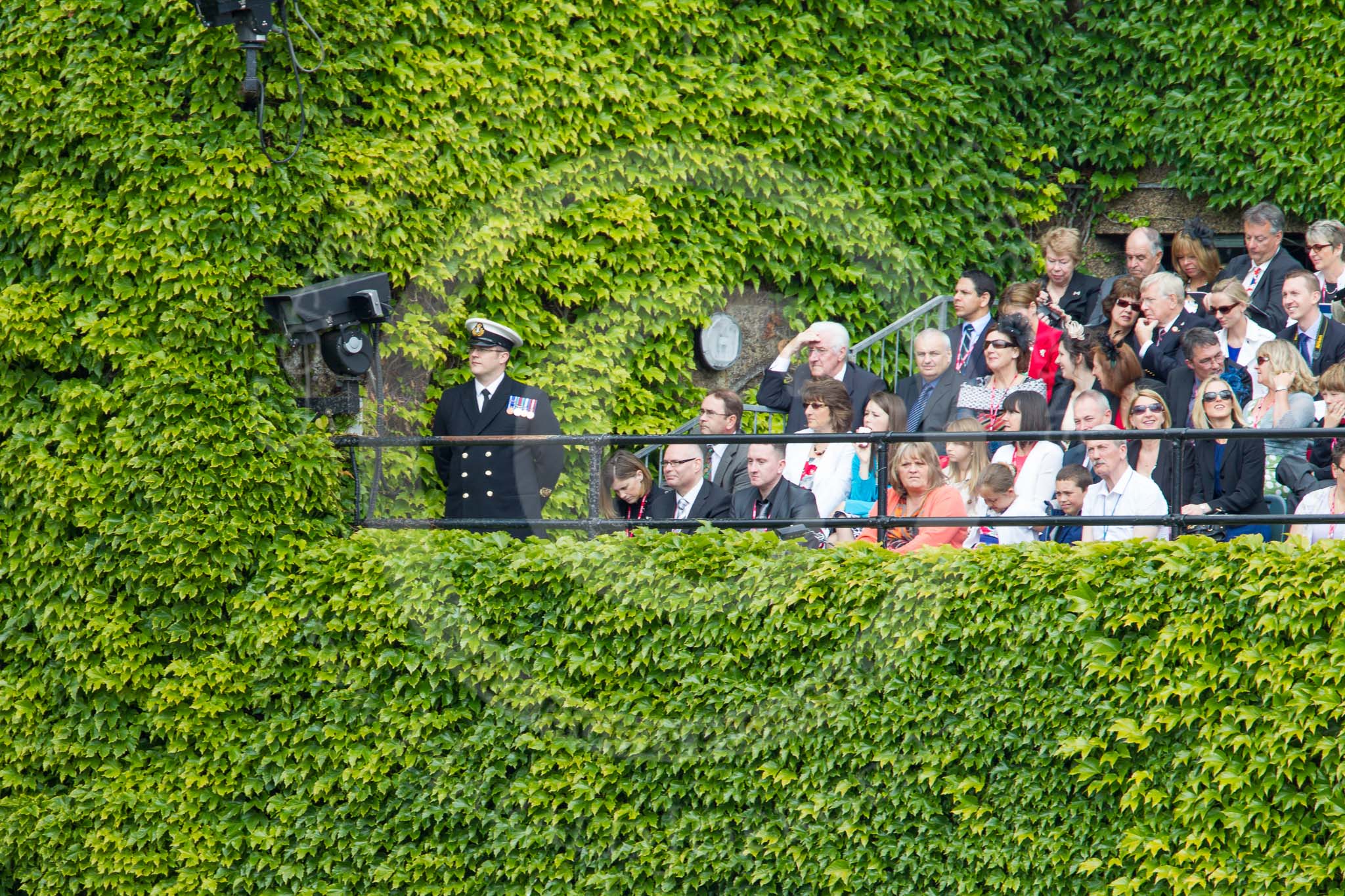 Trooping the Colour 2012: Spectators watching from the Citadel, the ivy-covered bunker on the Northern side of the Old Admirality Building..
Horse Guards Parade, Westminster,
London SW1,

United Kingdom,
on 16 June 2012 at 10:46, image #108