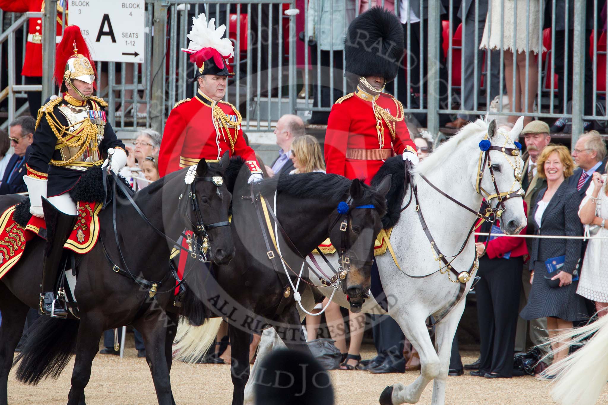 Trooping the Colour 2012: The Silver-Stick-in-Waiting, Colonel S H Cowen,
The Blues and Royals (Royal Horse Guards
and 1st Dragoons), then the Chief of Staff, Colonel R H W St G Bodington, Welsh Guards, and on the right Aide-de-Camp, Captain F A O Kuku, Grenadier Guards..
Horse Guards Parade, Westminster,
London SW1,

United Kingdom,
on 16 June 2012 at 10:59, image #164