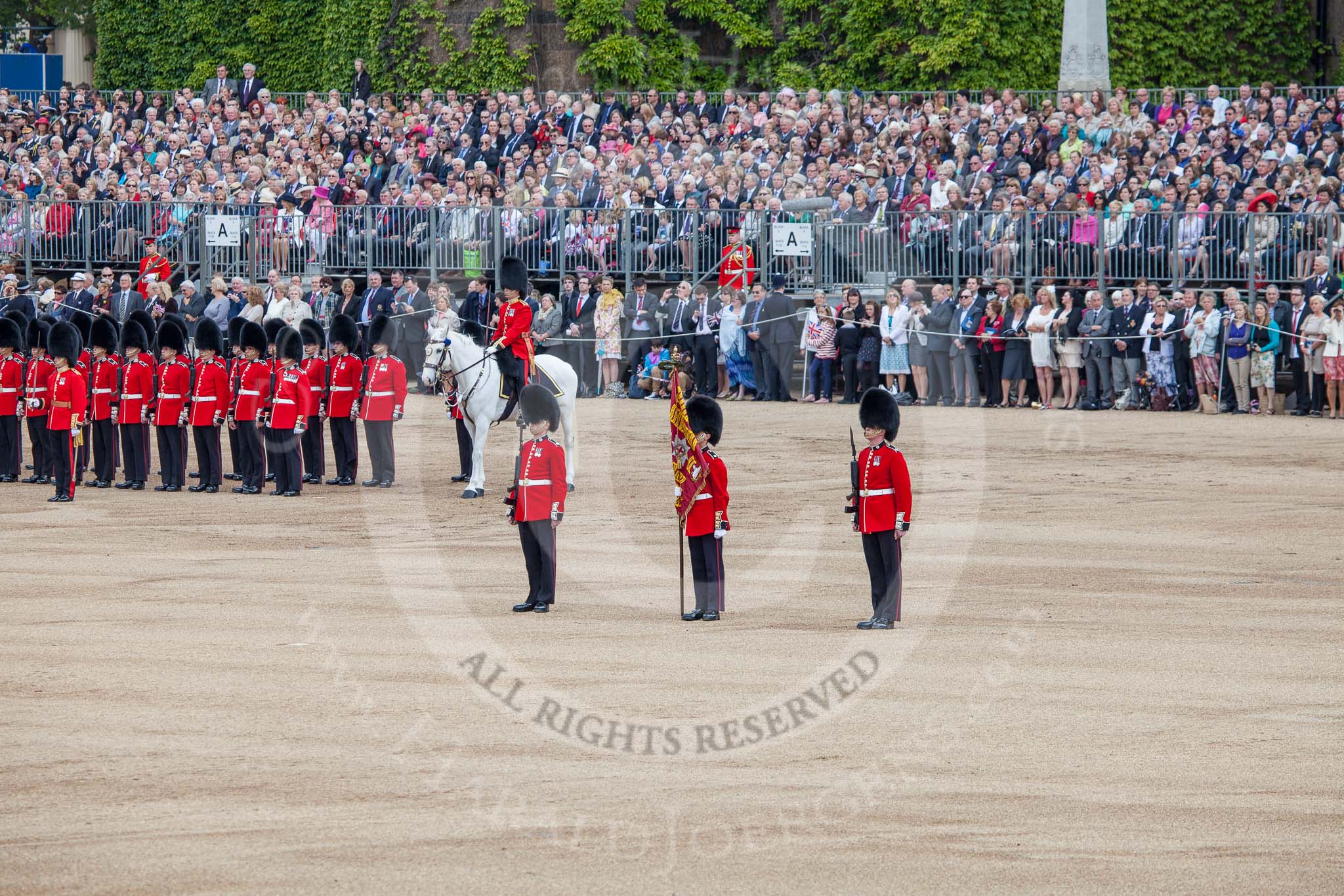 Trooping the Colour 2012: Protecting the Colour - the Colour Sergeant with the two Sentries. Behind them the Adjutant of the Parade, and No. 6 Guard, F Company Scots Guards..
Horse Guards Parade, Westminster,
London SW1,

United Kingdom,
on 16 June 2012 at 11:15, image #284