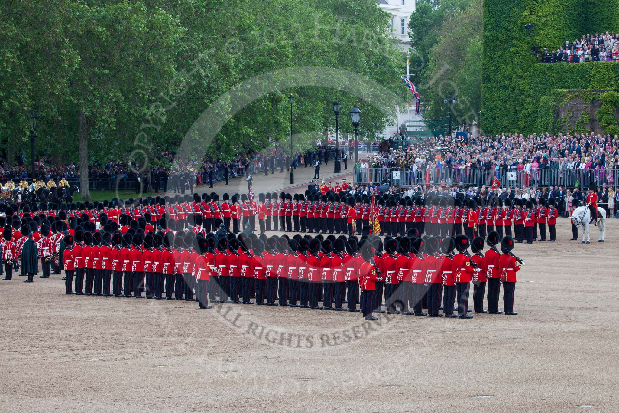 Trooping the Colour 2012: To quote the official programme: "With the Ensign and Colour at the front, the Escort slow marches towards No. 6 Guard so that it is ready to Troop The Colour.".
Horse Guards Parade, Westminster,
London SW1,

United Kingdom,
on 16 June 2012 at 11:23, image #323