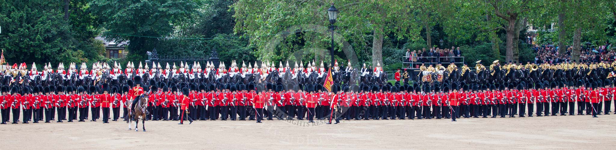 Trooping the Colour 2012: The Colour is trooped along the long lines of guardsmen, with No. 2 Guard at the left to No. 5 Guard on the right. In front, on the left, the Field Officer, and in the centre the Ensign, carrying the Colour..
Horse Guards Parade, Westminster,
London SW1,

United Kingdom,
on 16 June 2012 at 11:27, image #352