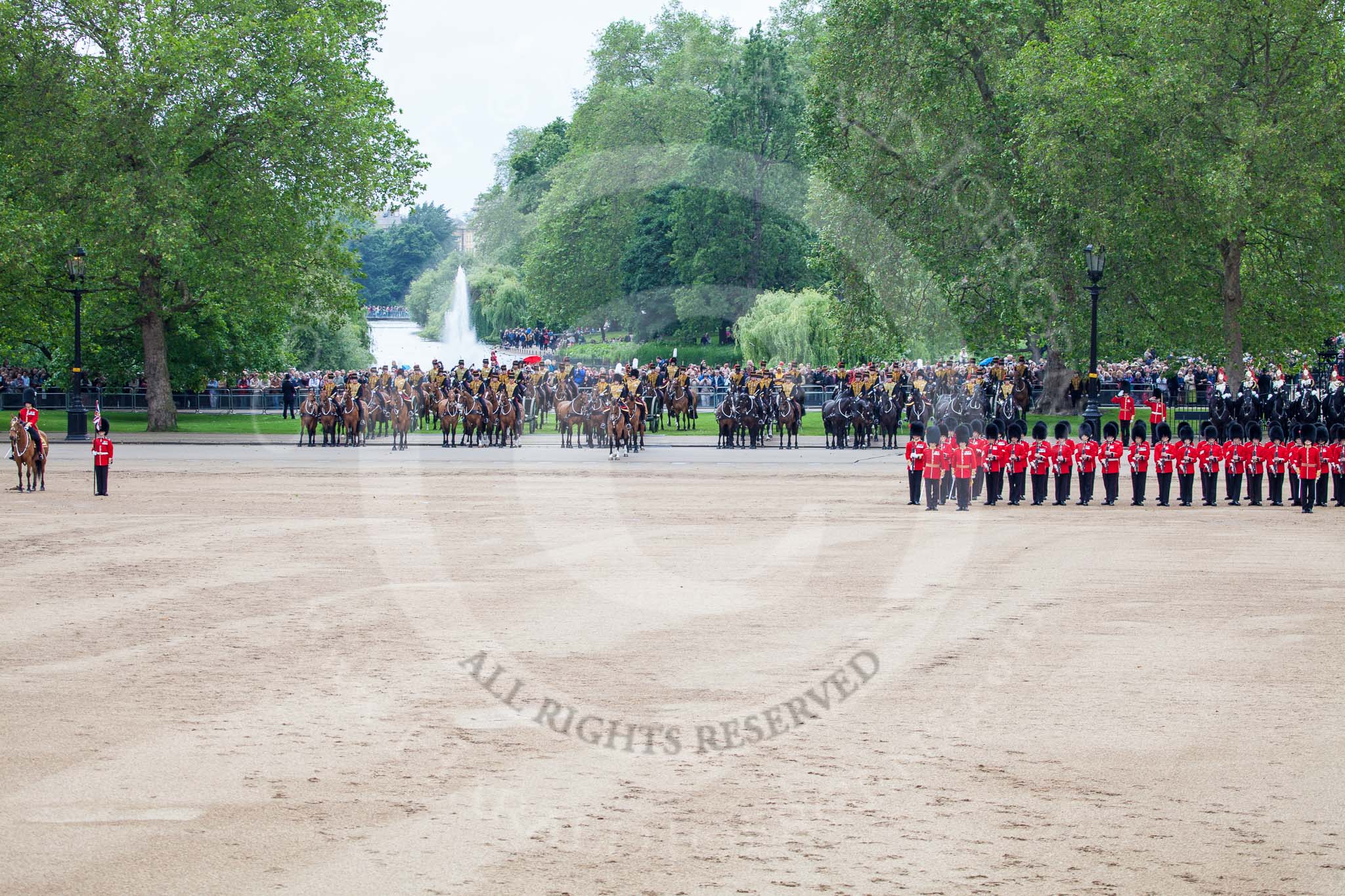 Trooping the Colour 2012: The "empty" space that had been occupied by No. 1 Guard, the Escort to the Colour.  Behind the line of guardsmen the Royal Horse Artillery, waiting in front of St. James's Park..
Horse Guards Parade, Westminster,
London SW1,

United Kingdom,
on 16 June 2012 at 11:27, image #353