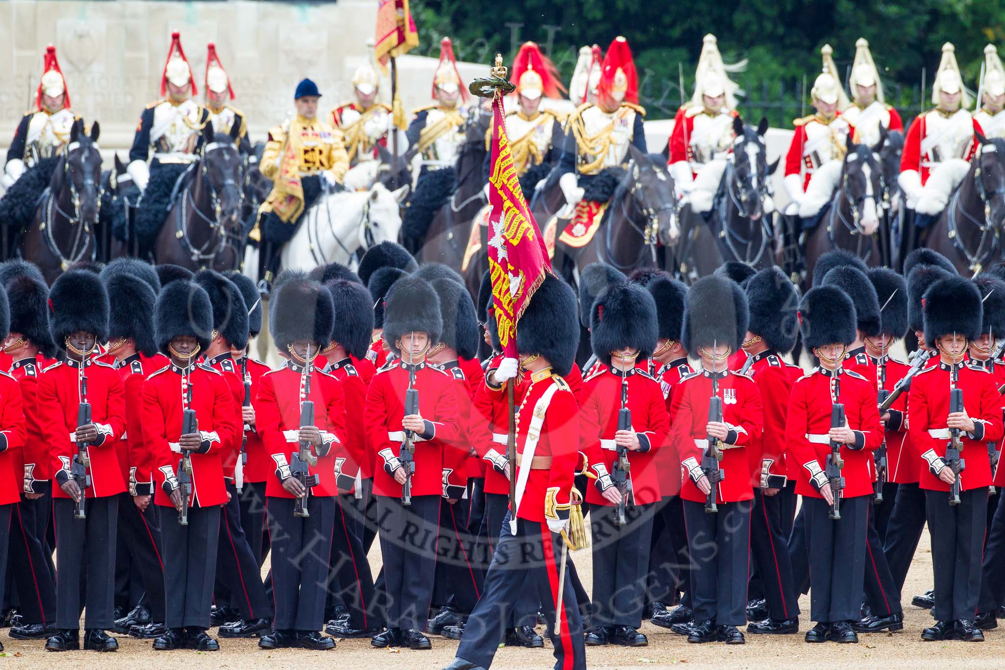 Trooping the Colour 2012: The Ensign, Second Lieutenant Hugo C Codrington, is trooping the Colour along No. 3 Guard, No. 7 Company, Coldstream Guards, whilst the Escort to the Colour, No. 1 Guard, is marching between the two lines of guardsmen..
Horse Guards Parade, Westminster,
London SW1,

United Kingdom,
on 16 June 2012 at 11:27, image #354
