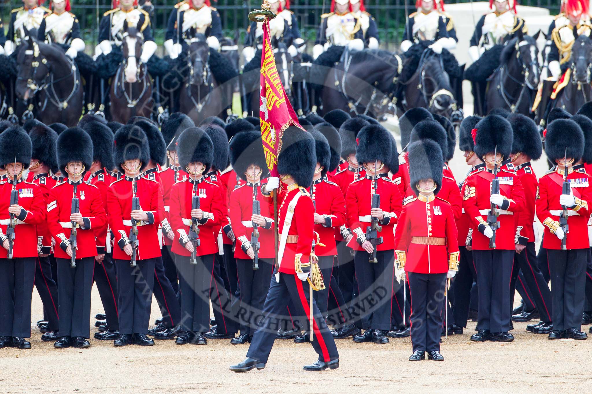 Trooping the Colour 2012: The Ensign, Second Lieutenant Hugo C Codrington, is trooping the Colour along No. 2 Guard, 1st Battalion Coldstream Guards, whilst the Escort to the Colour, No. 1 Guard, is marching between the two lines of guardsmen..
Horse Guards Parade, Westminster,
London SW1,

United Kingdom,
on 16 June 2012 at 11:27, image #356