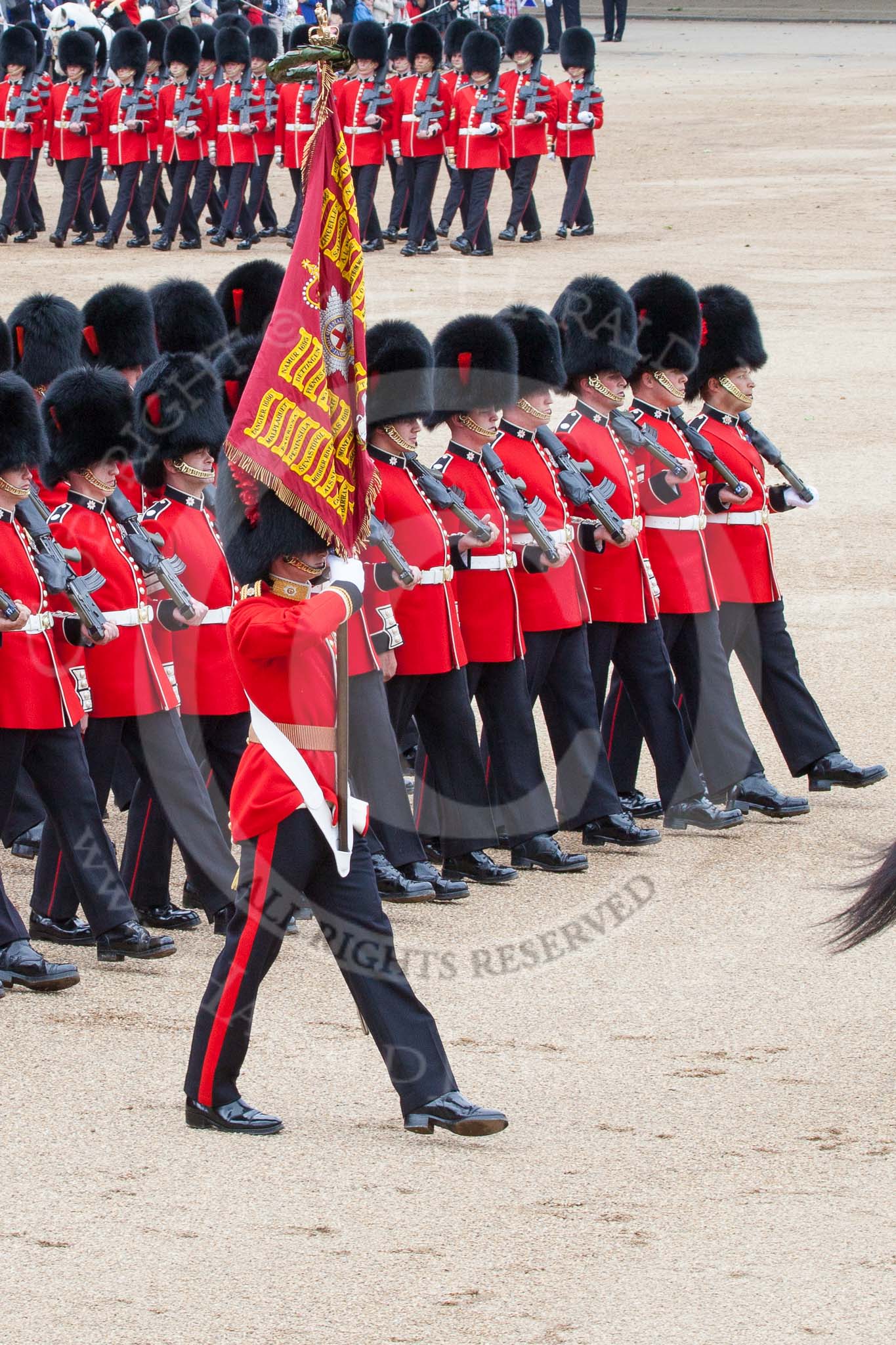 Trooping the Colour 2012: The Ensign, Second Lieutenant Hugo Codrington, carrying the Colour during the March Past..
Horse Guards Parade, Westminster,
London SW1,

United Kingdom,
on 16 June 2012 at 11:36, image #413
