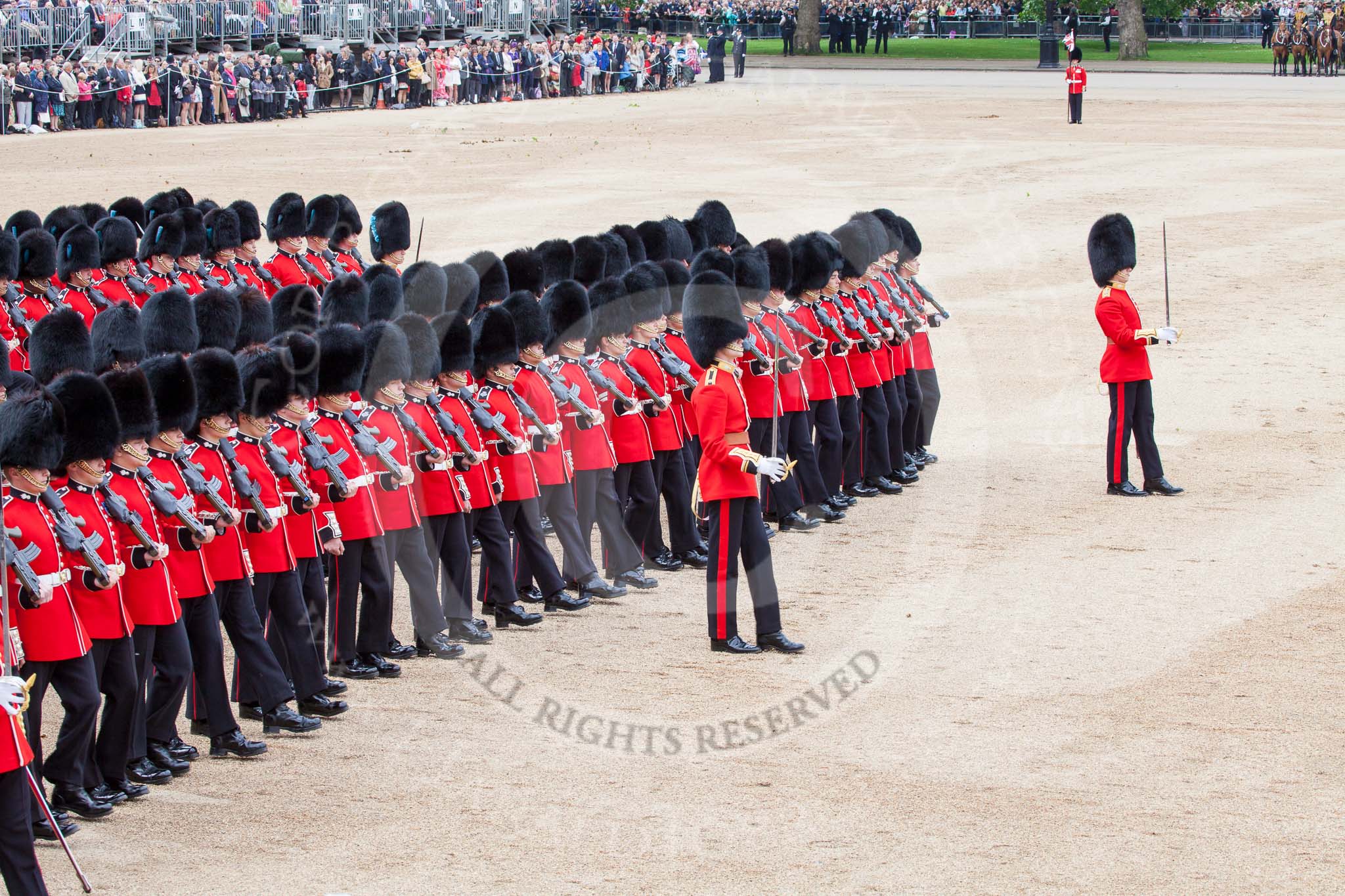 Trooping the Colour 2012: No. 4 Guard, Nijmegen Company Grenadier Guards, during the March Past. On the right of the photo Captain C J D Stevenson, in the middle Second Lieutenant C H P Sanford..
Horse Guards Parade, Westminster,
London SW1,

United Kingdom,
on 16 June 2012 at 11:37, image #431