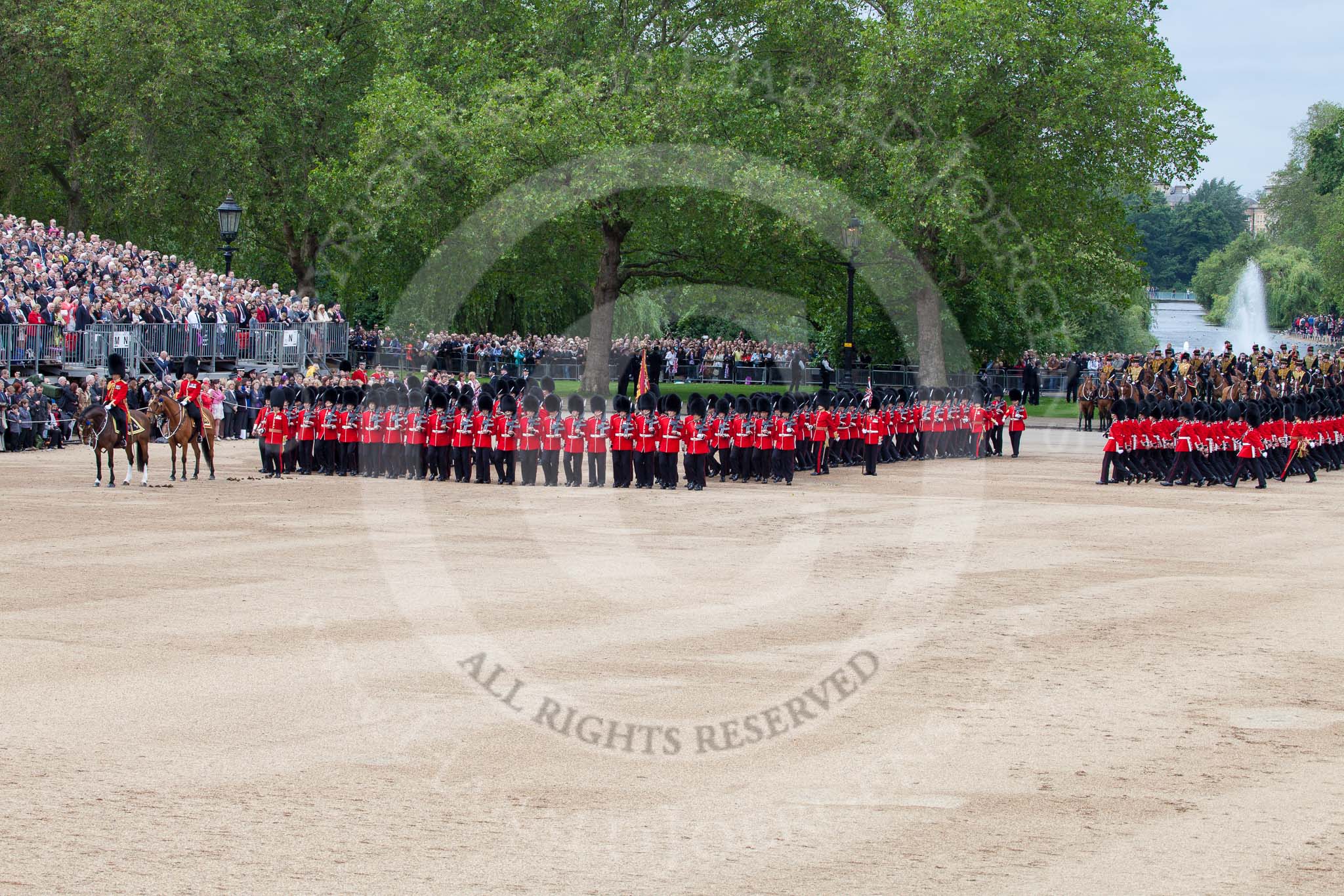 Trooping the Colour 2012: The March Past: The leading guards divisions, with No. 1 Guard, the Escort to the Colour, in front, have turned left again/are turning left..
Horse Guards Parade, Westminster,
London SW1,

United Kingdom,
on 16 June 2012 at 11:43, image #472