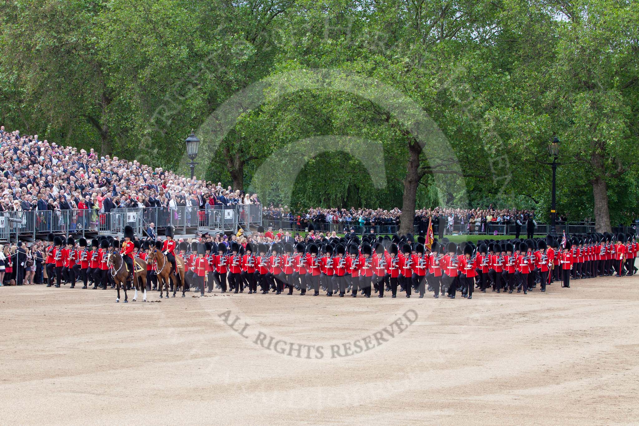 Trooping the Colour 2012: The March Past: The leading guards divisions, with No. 1 Guard, the Escort to the Colour, in front, have turned left again/are turning left..
Horse Guards Parade, Westminster,
London SW1,

United Kingdom,
on 16 June 2012 at 11:44, image #473