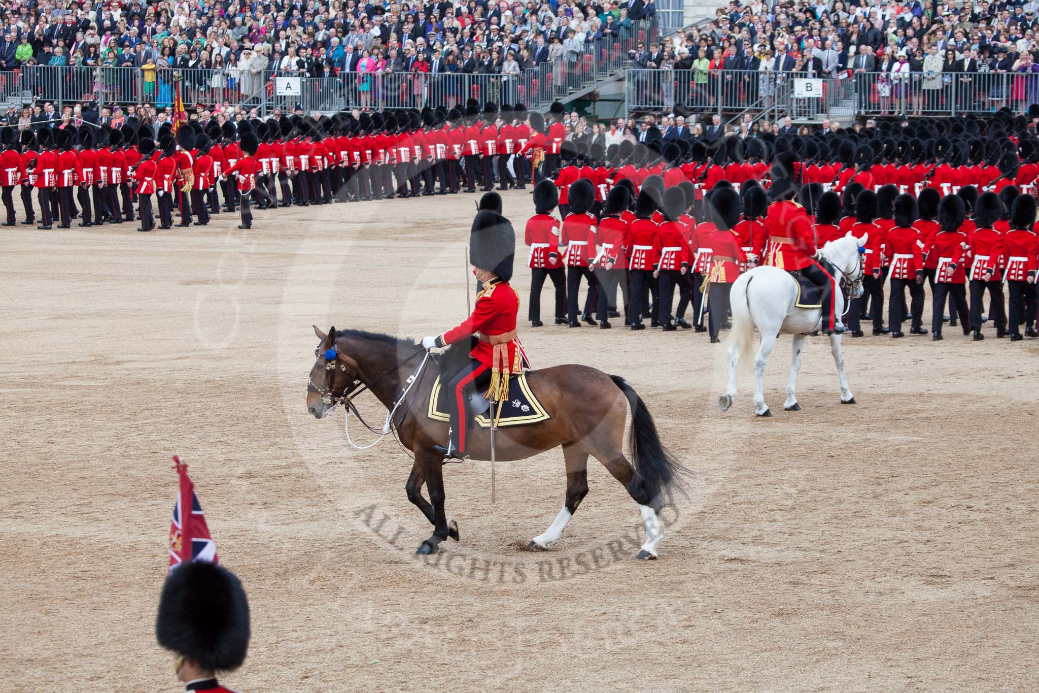 Trooping the Colour 2012: With the Adjutant of the Parade on the white horse following the guards divisions around Horse Guards Parade, the Field Officer returns to the centre of the action..
Horse Guards Parade, Westminster,
London SW1,

United Kingdom,
on 16 June 2012 at 11:47, image #503