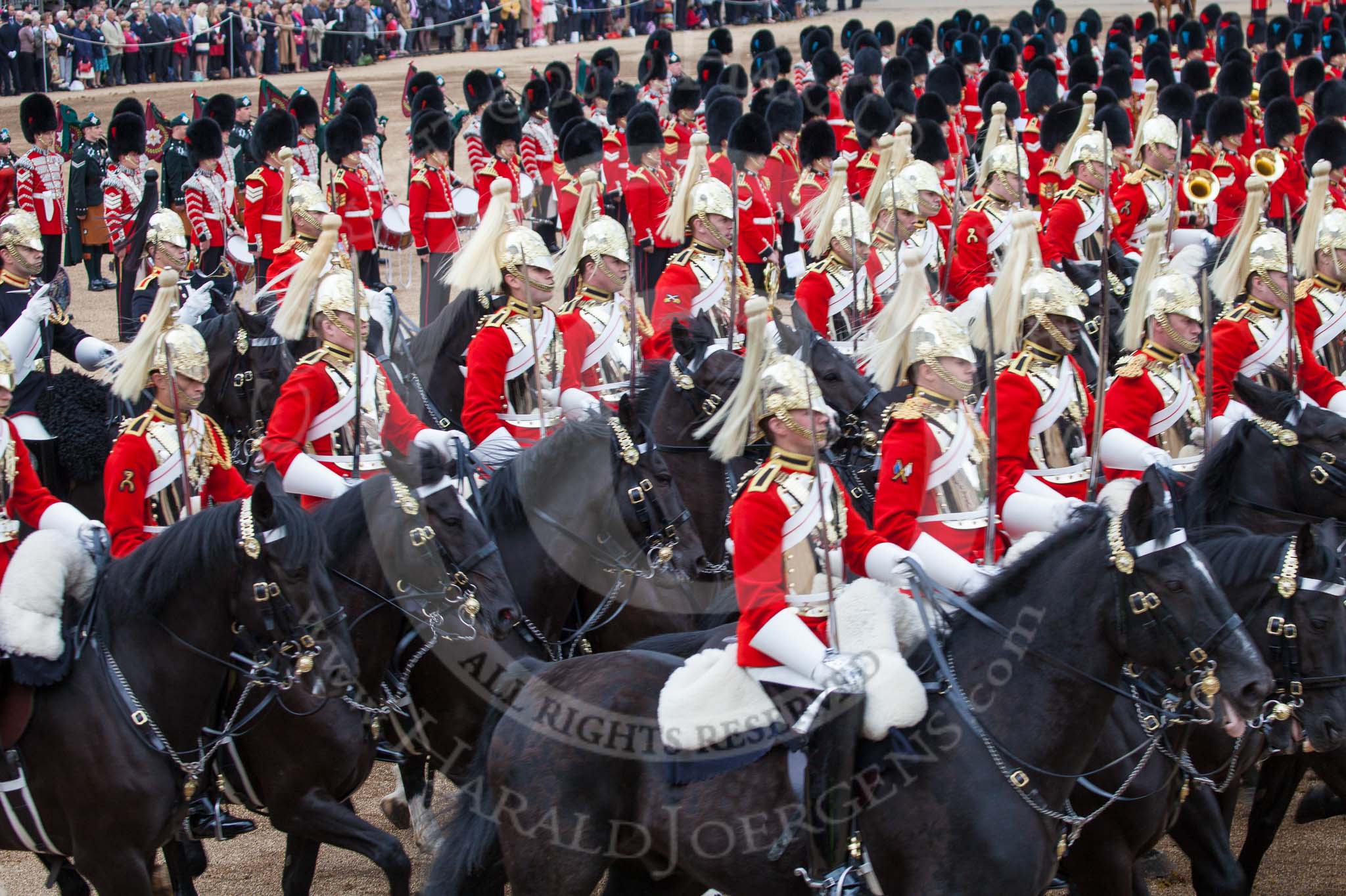 Trooping the Colour 2012: The Ride Past, here The Life Guards. The Massed Bands, on top of the image, are at the centre of Horse Guards Parade, the troops ride around them..
Horse Guards Parade, Westminster,
London SW1,

United Kingdom,
on 16 June 2012 at 12:00, image #593
