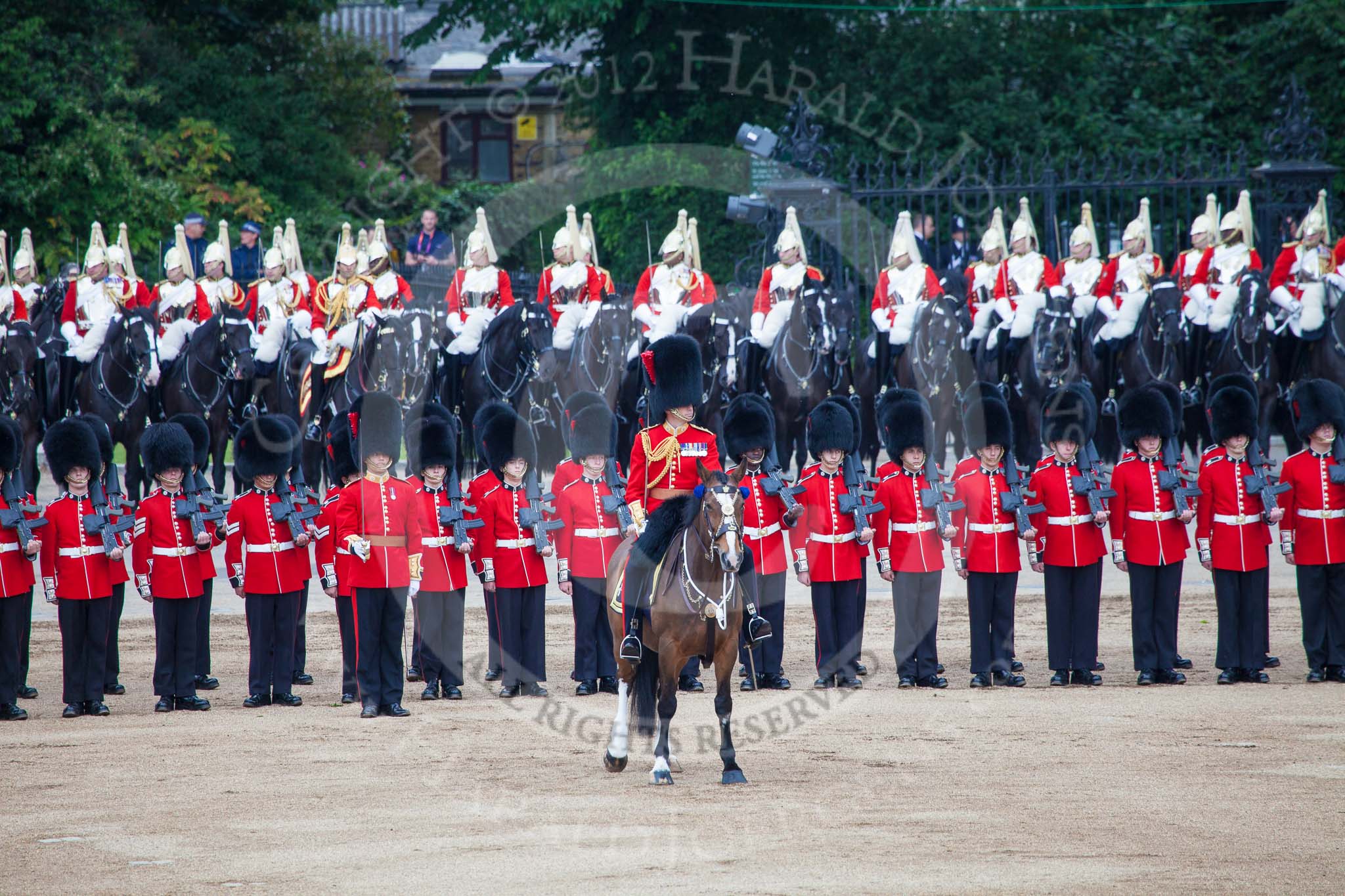 Trooping the Colour 2012: The Field Officer in Brigade Waiting, Lieutenant Colonel R C N Sergeant, Coldstream Guards, in front of No. 3 Guard, No. 7 Company, Coldstream Guards. Behind them troopers from The Life Guards..
Horse Guards Parade, Westminster,
London SW1,

United Kingdom,
on 16 June 2012 at 12:02, image #608
