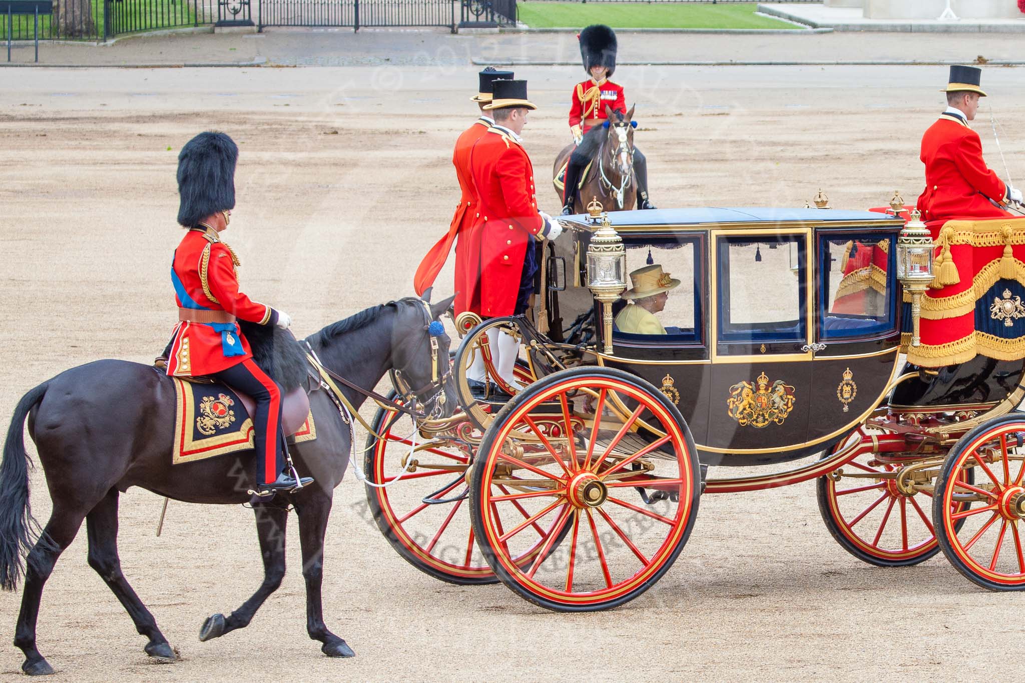 Trooping the Colour 2012: The Glass Coach carrying HM The Queen and HRH The Duke of Edinburgh at the end of the parade. Behind HRH The Prince of Wales, in the centre of the image, behind the coach, the Field Officer..
Horse Guards Parade, Westminster,
London SW1,

United Kingdom,
on 16 June 2012 at 12:11, image #669