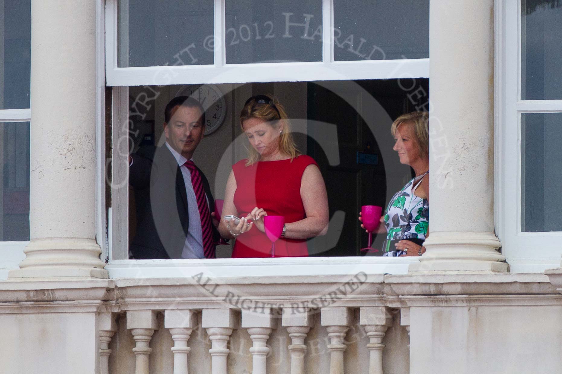 Trooping the Colour 2012: Probably waiting for the flypast as well, in a windows of the Old Admirality Building, again with a clock in the background..
Horse Guards Parade, Westminster,
London SW1,

United Kingdom,
on 16 June 2012 at 12:52, image #705