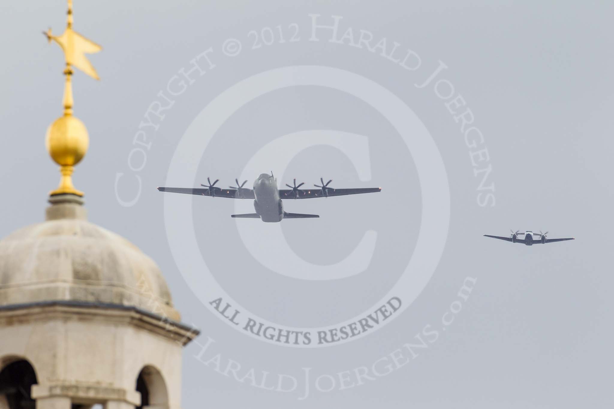 Trooping the Colour 2012: The Flypast: RAF Hercules transporter and two HS-125 about to fly over Horse Guards Building..
Horse Guards Parade, Westminster,
London SW1,

United Kingdom,
on 16 June 2012 at 13:00, image #722