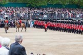 Trooping the Colour 2012: The March Past: No. 1 Guard (Escort to the Colour), 1st Battalion Coldstream Guards, marching along the western side of Horse Guards Parade for the second time, turning to the left again. Leading are the Field Officer and the Major of the Parade..
Horse Guards Parade, Westminster,
London SW1,

United Kingdom,
on 16 June 2012 at 11:44, image #475