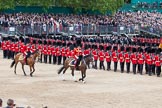 Trooping the Colour 2012: The March Past: No. 1 Guard (Escort to the Colour), 1st Battalion Coldstream Guards, marching along the western side of Horse Guards Parade for the second time, turning to the left again. In front the Field Officer and the Major of the Parade..
Horse Guards Parade, Westminster,
London SW1,

United Kingdom,
on 16 June 2012 at 11:44, image #479