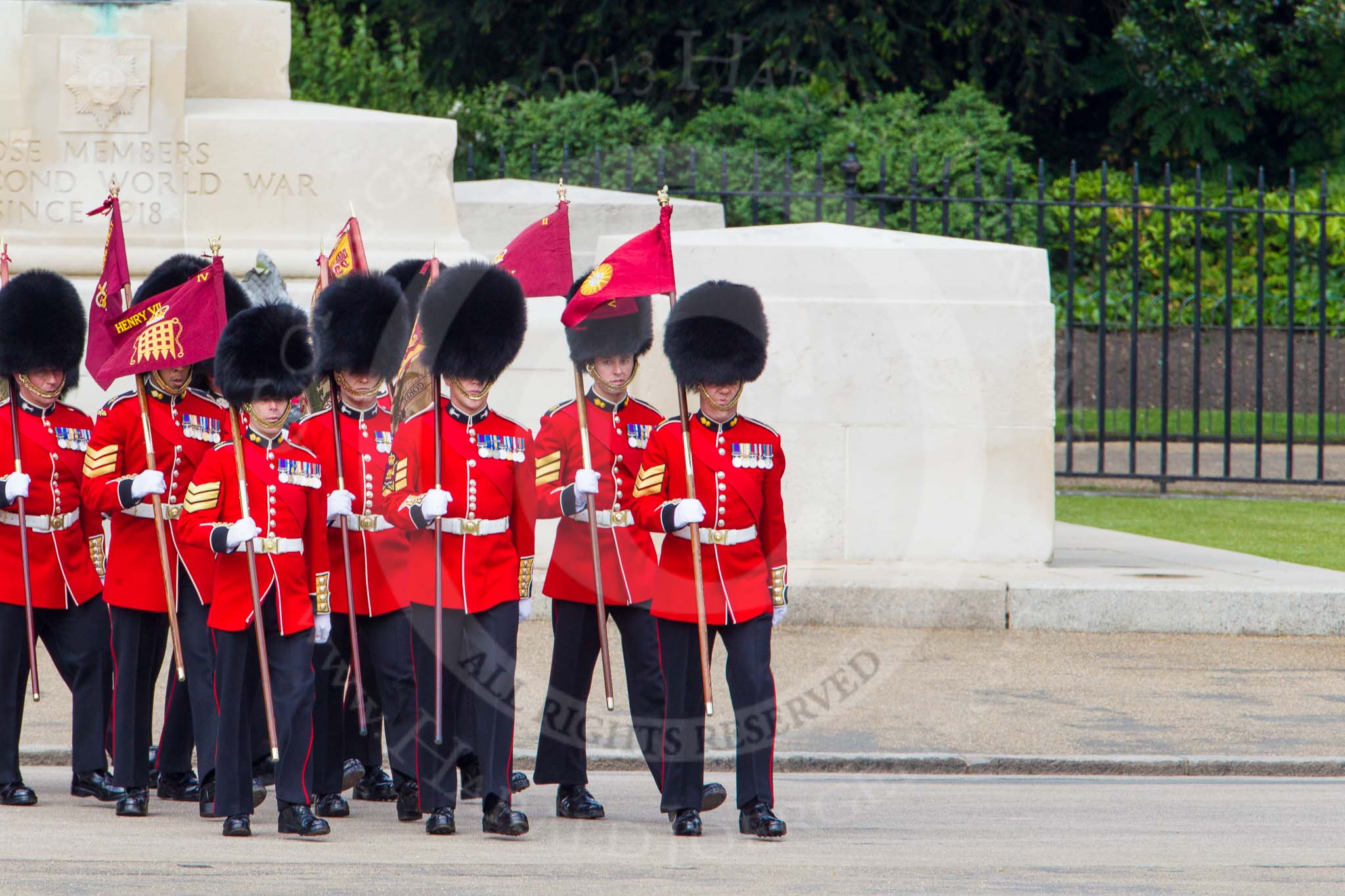 The Colonel's Review 2013: The 'Keepers of the Ground', guardsmen bearing marker flags for their respective regiments, turning towards Horse Guards Parade at the Guards Memorial..
Horse Guards Parade, Westminster,
London SW1,

United Kingdom,
on 08 June 2013 at 09:53, image #24