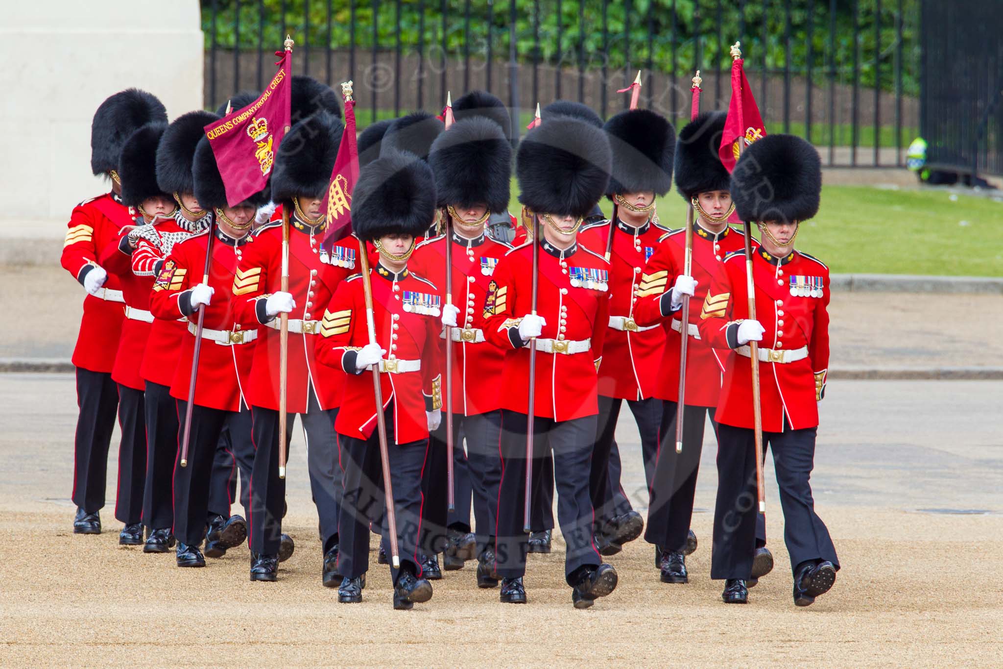 The Colonel's Review 2013: The 'Keepers of the Ground', guardsmen bearing marker flags for their respective regiments, turning towards Horse Guards Parade at the Guards Memorial..
Horse Guards Parade, Westminster,
London SW1,

United Kingdom,
on 08 June 2013 at 09:53, image #25