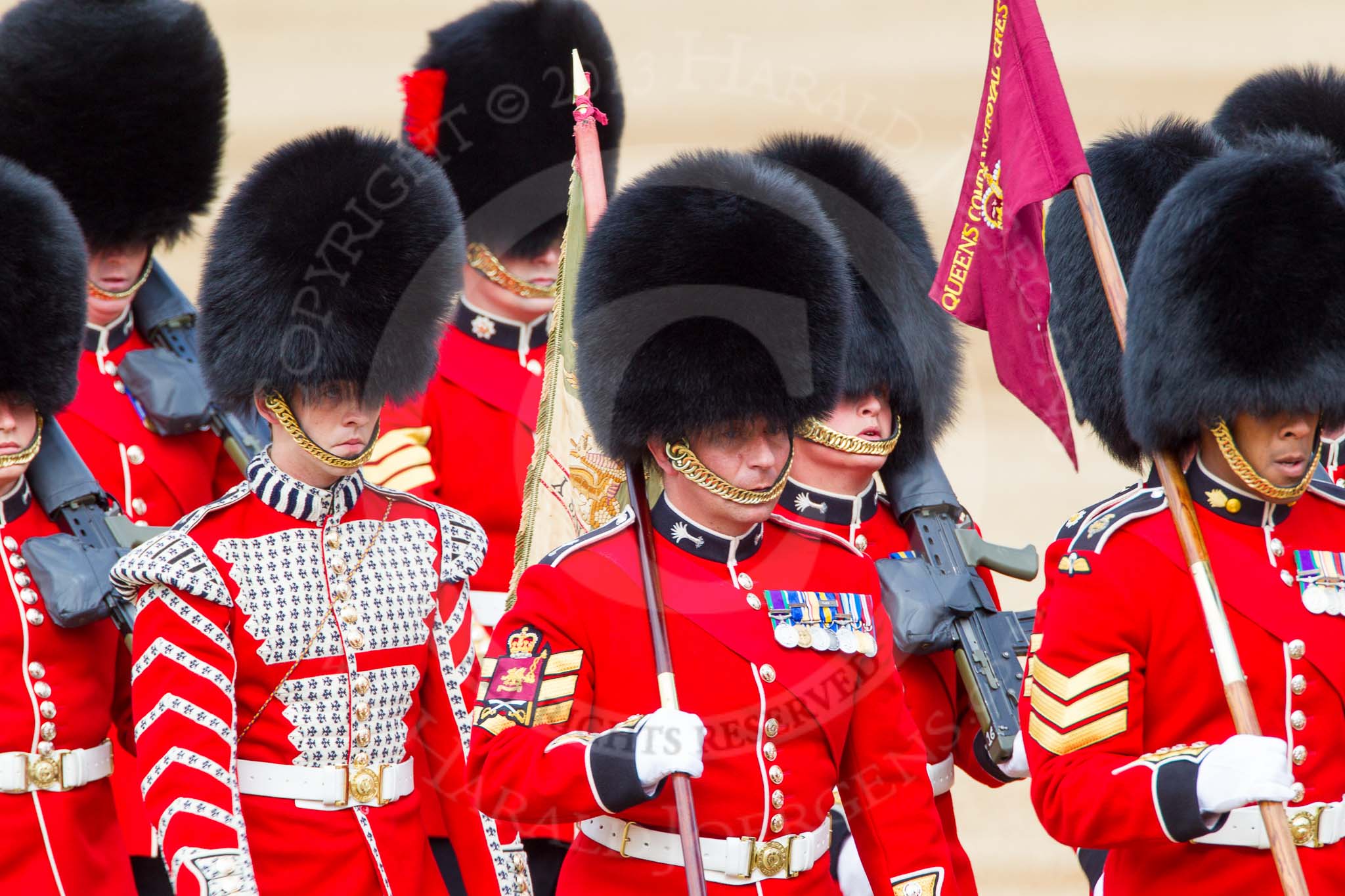 The Colonel's Review 2013: The 'Keepers of the Ground', guardsmen bearing marker flags for their respective regiments, turning towards Horse Guards Parade at the Guards Memorial..
Horse Guards Parade, Westminster,
London SW1,

United Kingdom,
on 08 June 2013 at 09:54, image #30