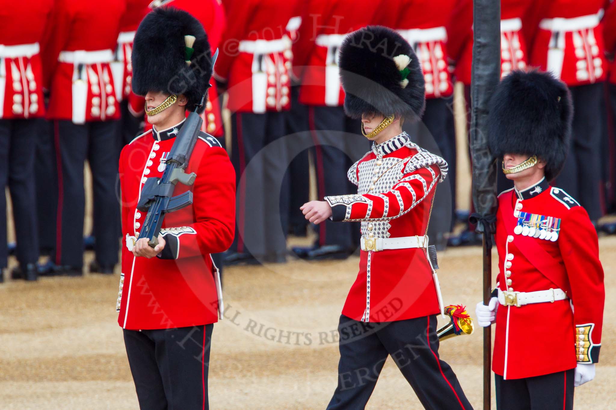 The Colonel's Review 2013: Welsh Guards Drummer approaching Colour Sergeant R J Heath, Welsh Guards, carrying the Colour and the two sentries..
Horse Guards Parade, Westminster,
London SW1,

United Kingdom,
on 08 June 2013 at 10:32, image #139