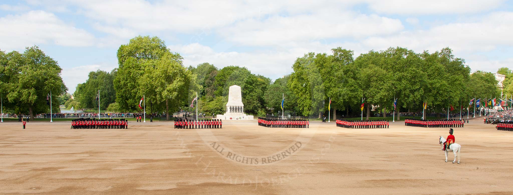 The Colonel's Review 2013: A wide angle overview of Horse Guards Parade - from left to right, No. 1 to No. 4 Guard. Behind No. 1 Guard St. James's Park Lake, behind No. 3 Guard the Guards Memorial..
Horse Guards Parade, Westminster,
London SW1,

United Kingdom,
on 08 June 2013 at 10:36, image #166