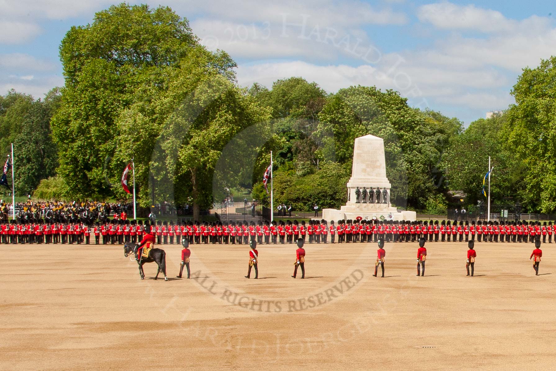 The Colonel's Review 2013: The eighteen officers are marching back towards their Guards, flanked by the Major and the Adjutant of the Parade..
Horse Guards Parade, Westminster,
London SW1,

United Kingdom,
on 08 June 2013 at 10:41, image #196