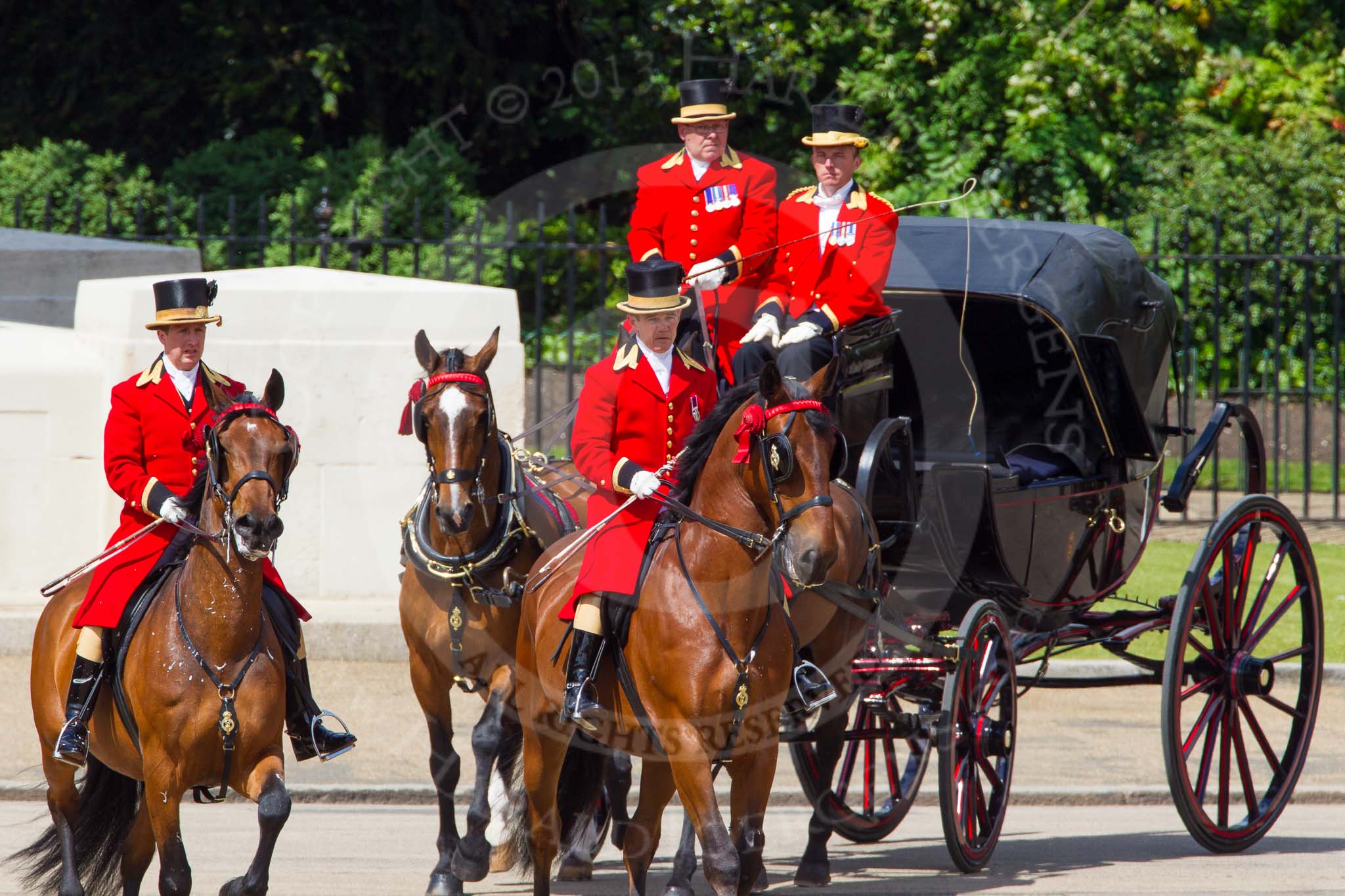 The Colonel's Review 2013: Two grooms leading the group of carriages with members of the Royal Family from Buckingham Palace to Horse Guards Building..
Horse Guards Parade, Westminster,
London SW1,

United Kingdom,
on 08 June 2013 at 10:50, image #220