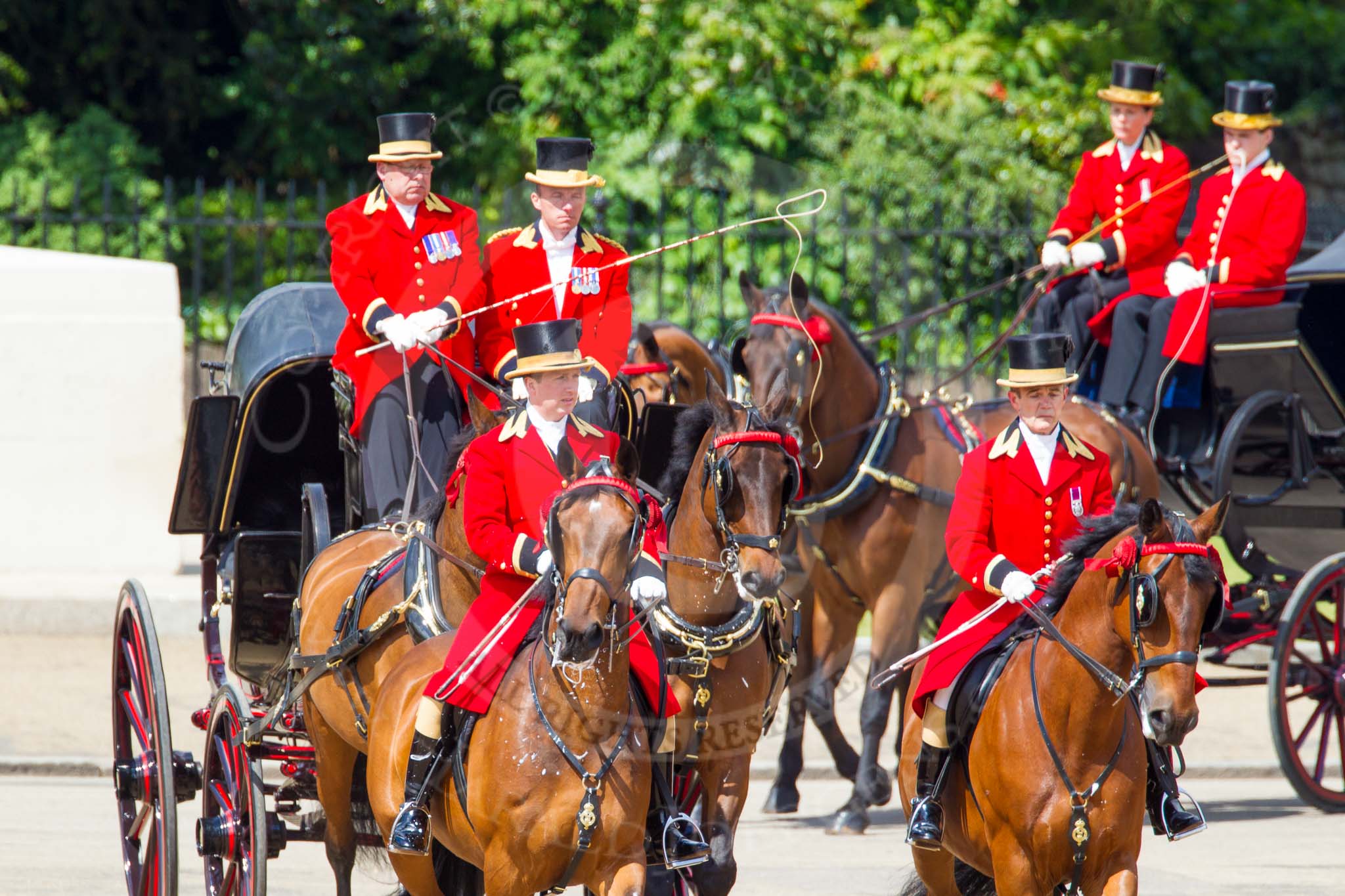 The Colonel's Review 2013: Two grooms leading the group of carriages with members of the Royal Family from Buckingham Palace to Horse Guards Building..
Horse Guards Parade, Westminster,
London SW1,

United Kingdom,
on 08 June 2013 at 10:50, image #221