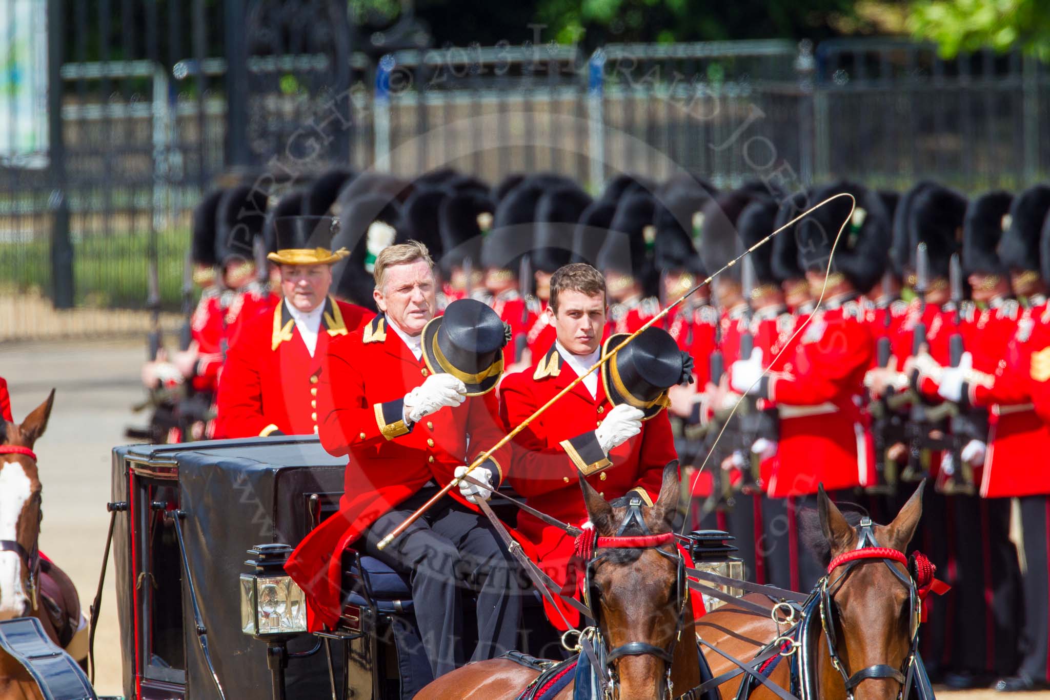 The Colonel's Review 2013: The coachmen salute when passing the Colour..
Horse Guards Parade, Westminster,
London SW1,

United Kingdom,
on 08 June 2013 at 10:51, image #228