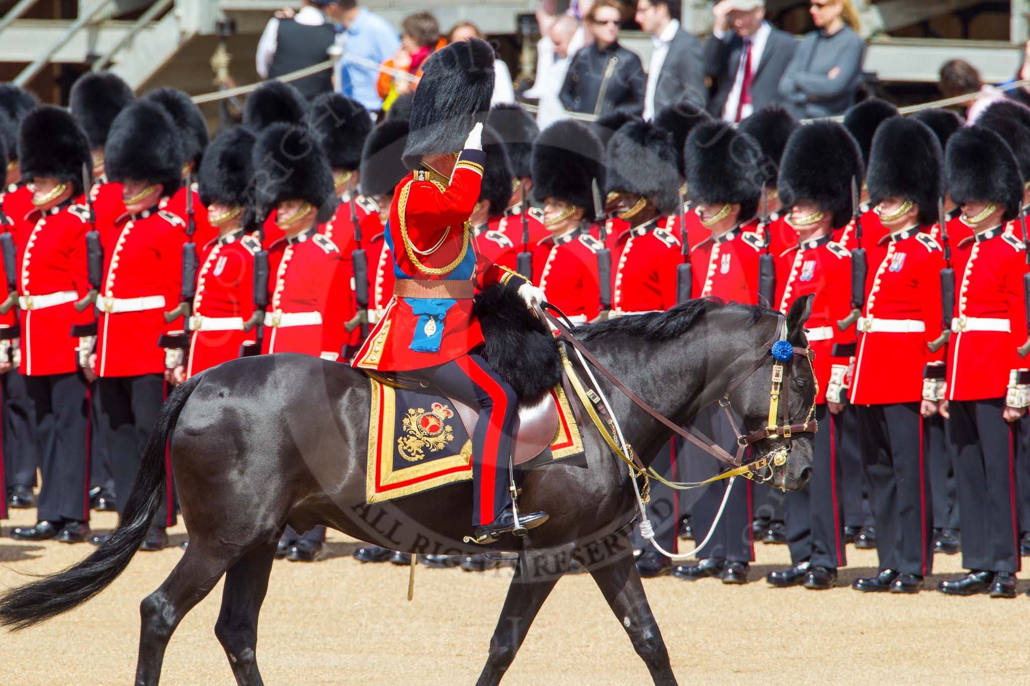 The Colonel's Review 2013: HRH The Prince of Wales, Colonel Welsh Guards saluting the Colour during the Inspection of the Line..
Horse Guards Parade, Westminster,
London SW1,

United Kingdom,
on 08 June 2013 at 11:03, image #356